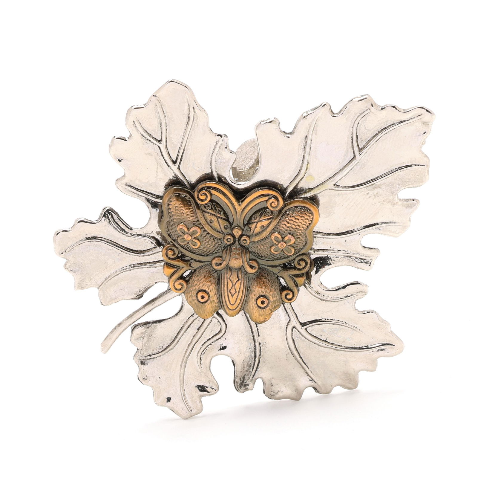 Silver-Tone and Bronze Leaf Brooch, Sylvia Dahl: Silver-Tone and Bronze Leaf Brooch, Sylvia Dahl the silver-tone brooch in the form of a maple leaf, set to the center with a brass butterfly, completed with a hinged clip, signed, XRF testing brass.