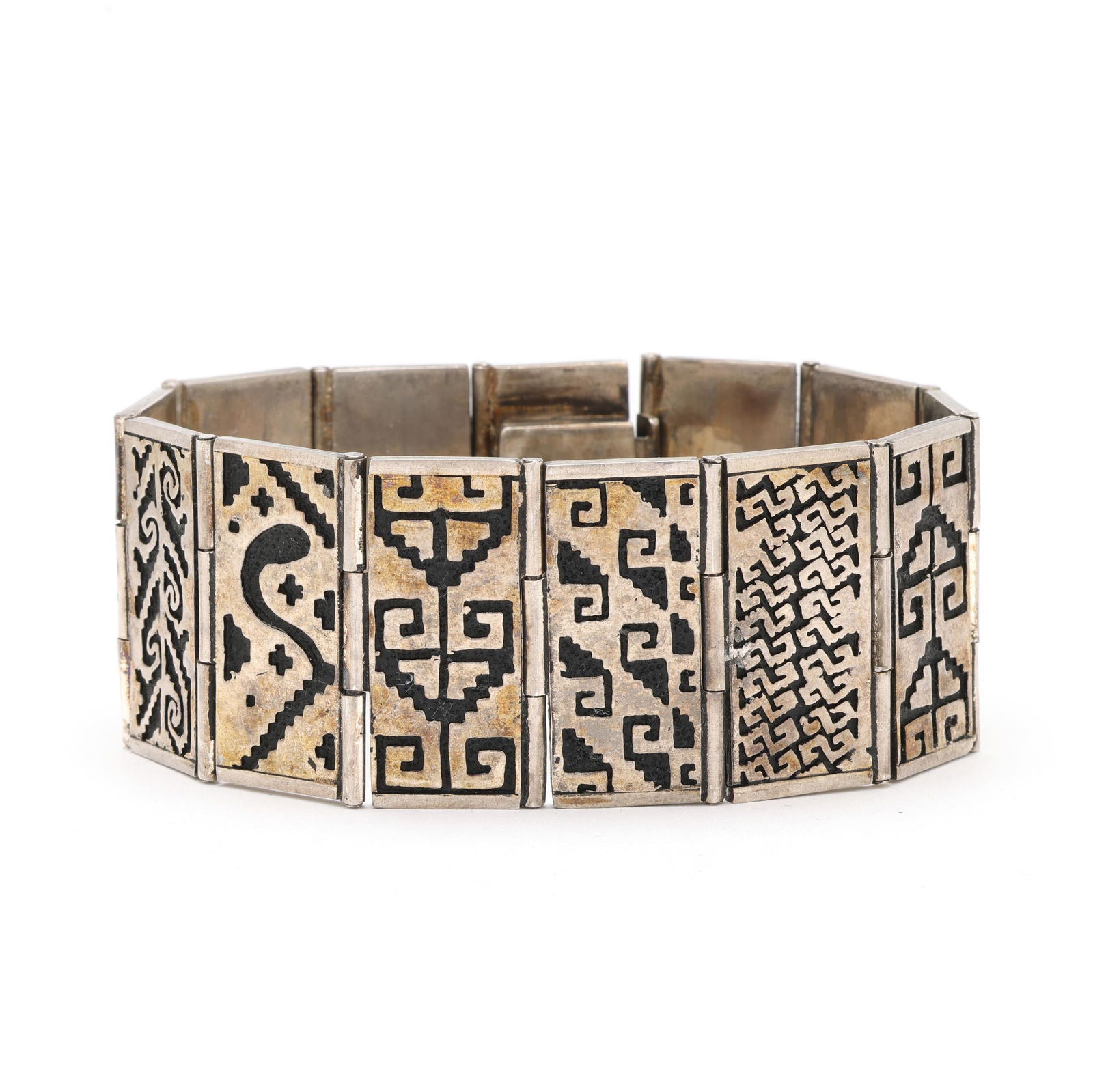 Silver Link Bracelet, Mexico: Silver Link Bracelet, Mexico the Mesoamerican motif link bracelet, completed with box clasp, stamped Mexico / Loca / GL-02 / 925. 1 3/8 x 8.5 in. 4.170 troy oz. Private Collection, Asheville,