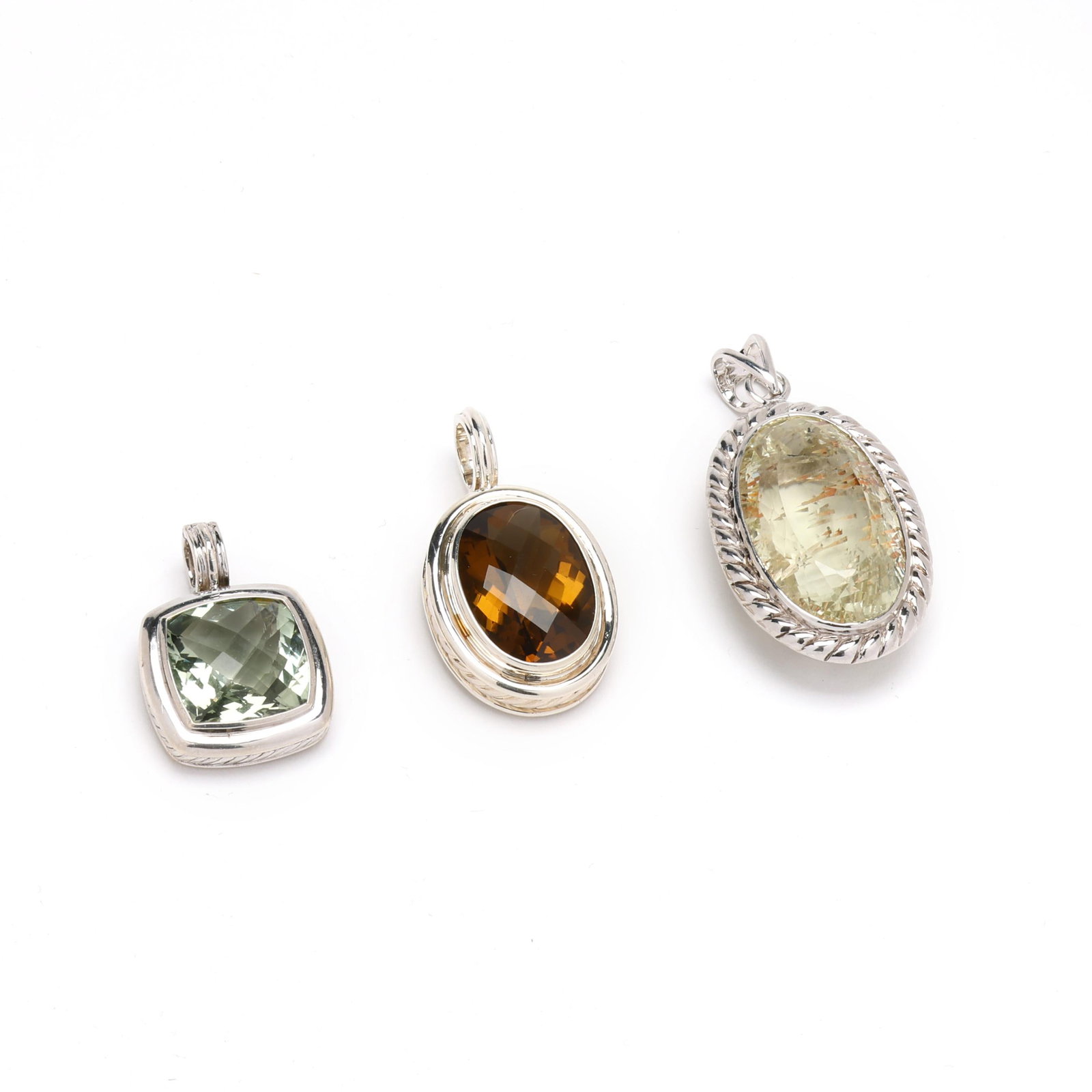 Three Silver and Gem-Set Pendants: Three Silver and Gem-Set Pendants to include: a silver pendant bezel set with a cushion checkerboard cut praseolite quartz (18 x 18mm), completed with a hinged bail, stamped 925 (1 3/8 in.); a