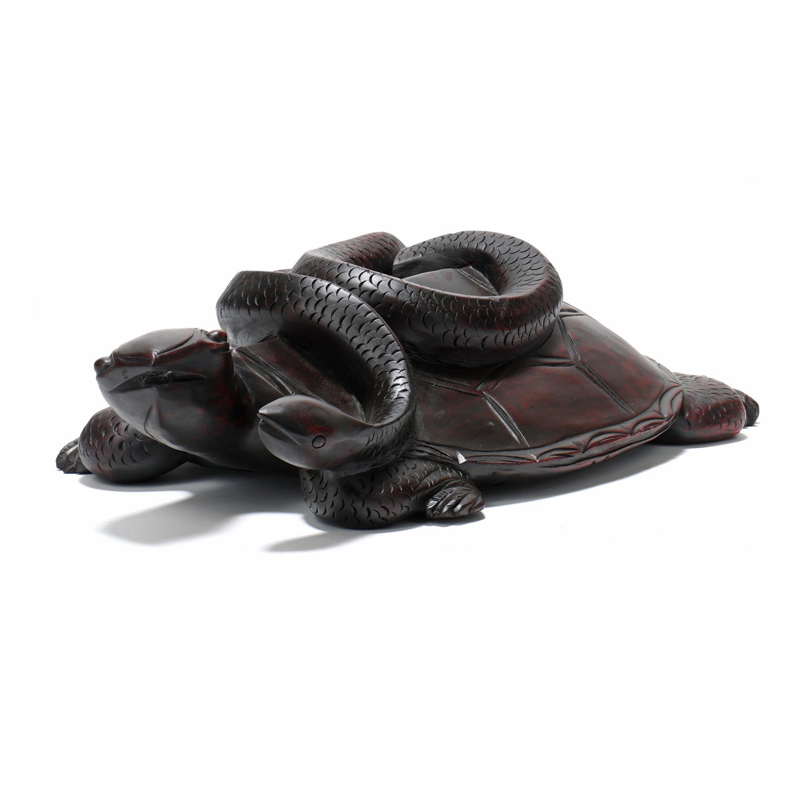 Carved Mahogany Turtle and Snake: Carved Mahogany Turtle and Snake late 20th century, carved from a single board, finished on all sides, appears unmarked. 7 x 14 x 26 in. Additional high-resolution photos are available at