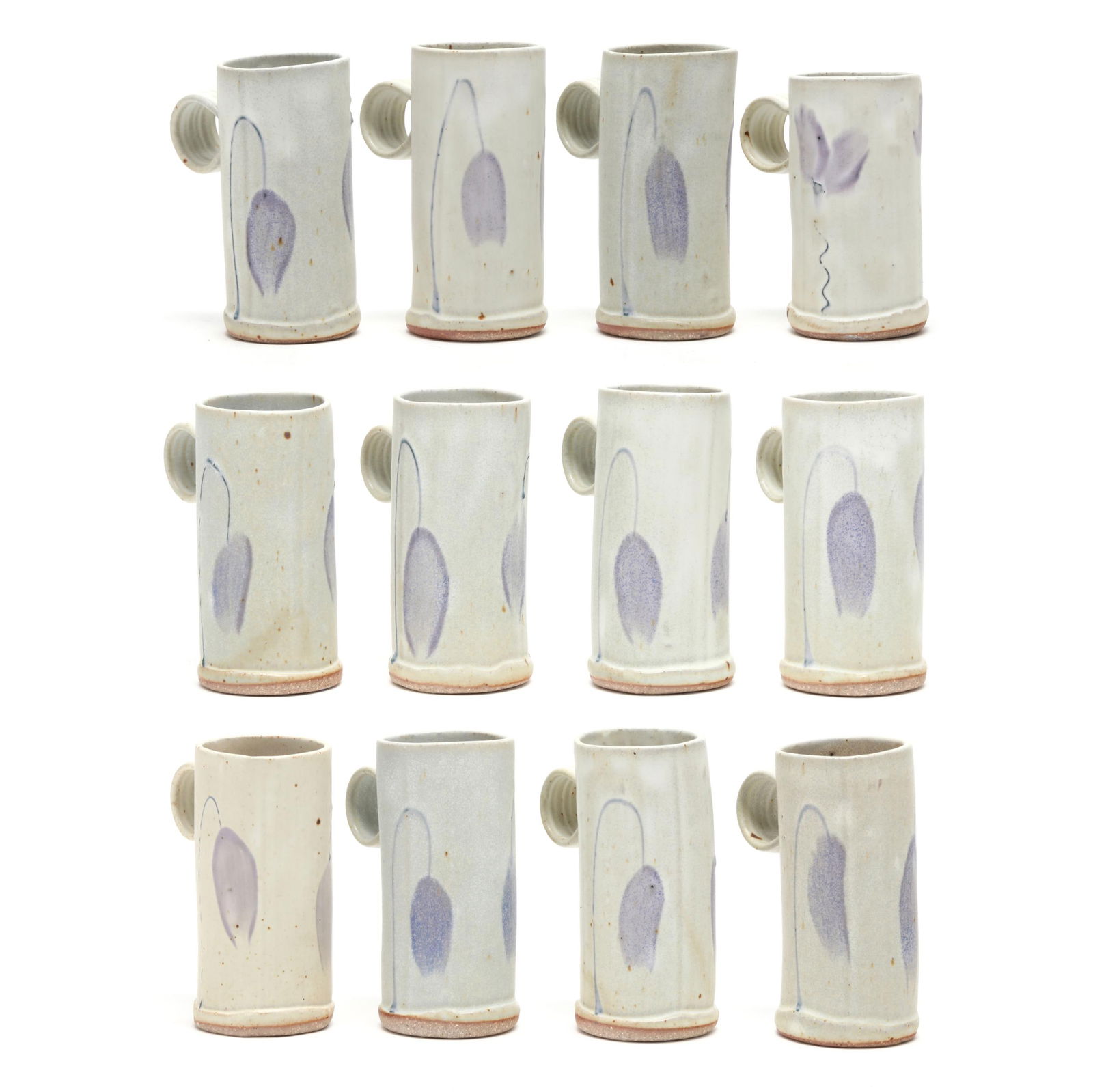 Barking Spider (Bakersville, NC), Twelve Commissioned Pottery Espresso Cups: Barking Spider (Bakersville, NC), Twelve Commissioned Pottery Espresso Cups style no longer in production, snowy white glazed stoneware with periwinkle and lavender flower motif, each in tall