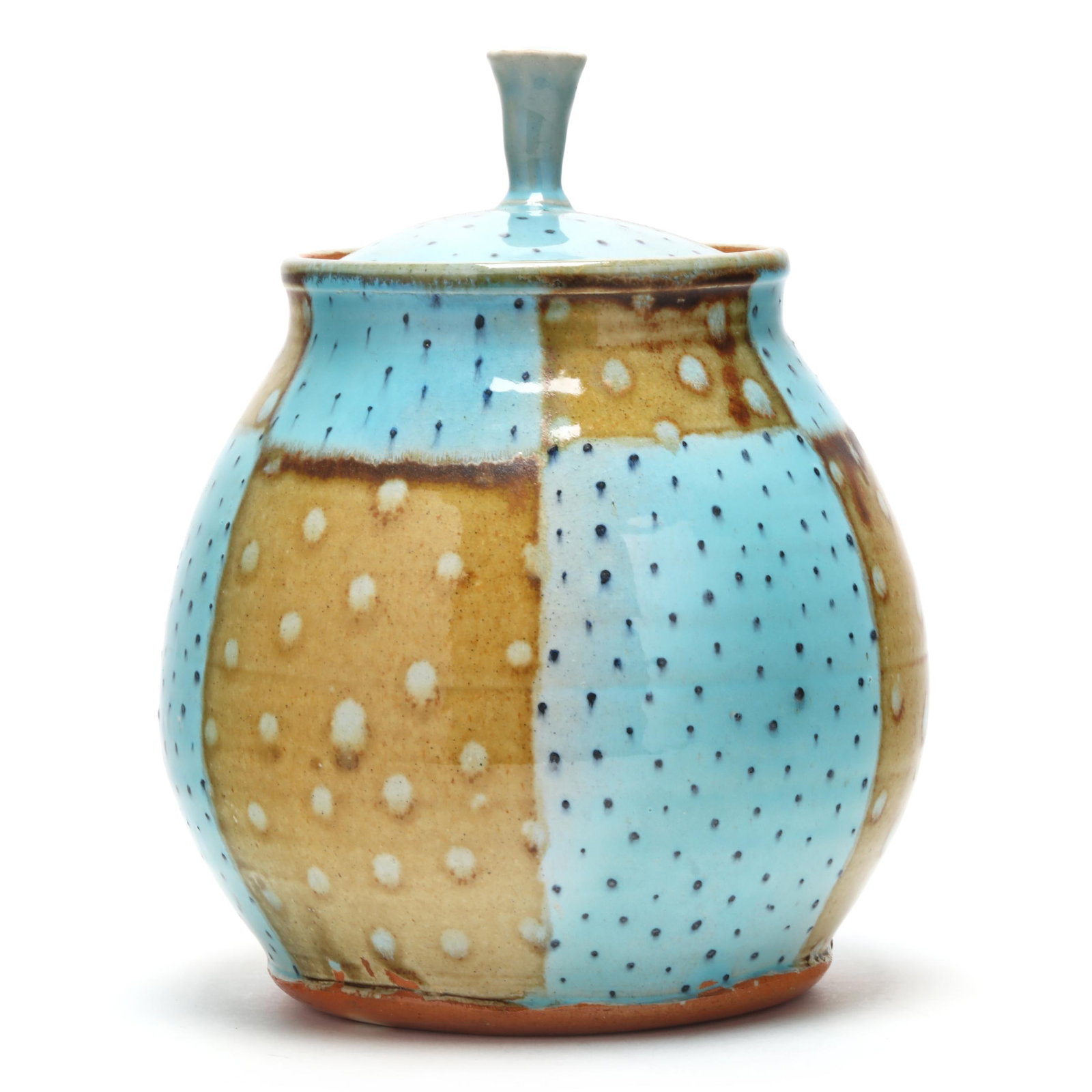 Courtney Martin (NC), Art Pottery Cookie Jar: Courtney Martin (NC), Art Pottery Cookie Jar stone ware lidded cookie jar with patchwork pattern in bright blue and soft olive glazes, stamped "CM" to base. 9 1/2 x 7 14 in. diameter Courtney