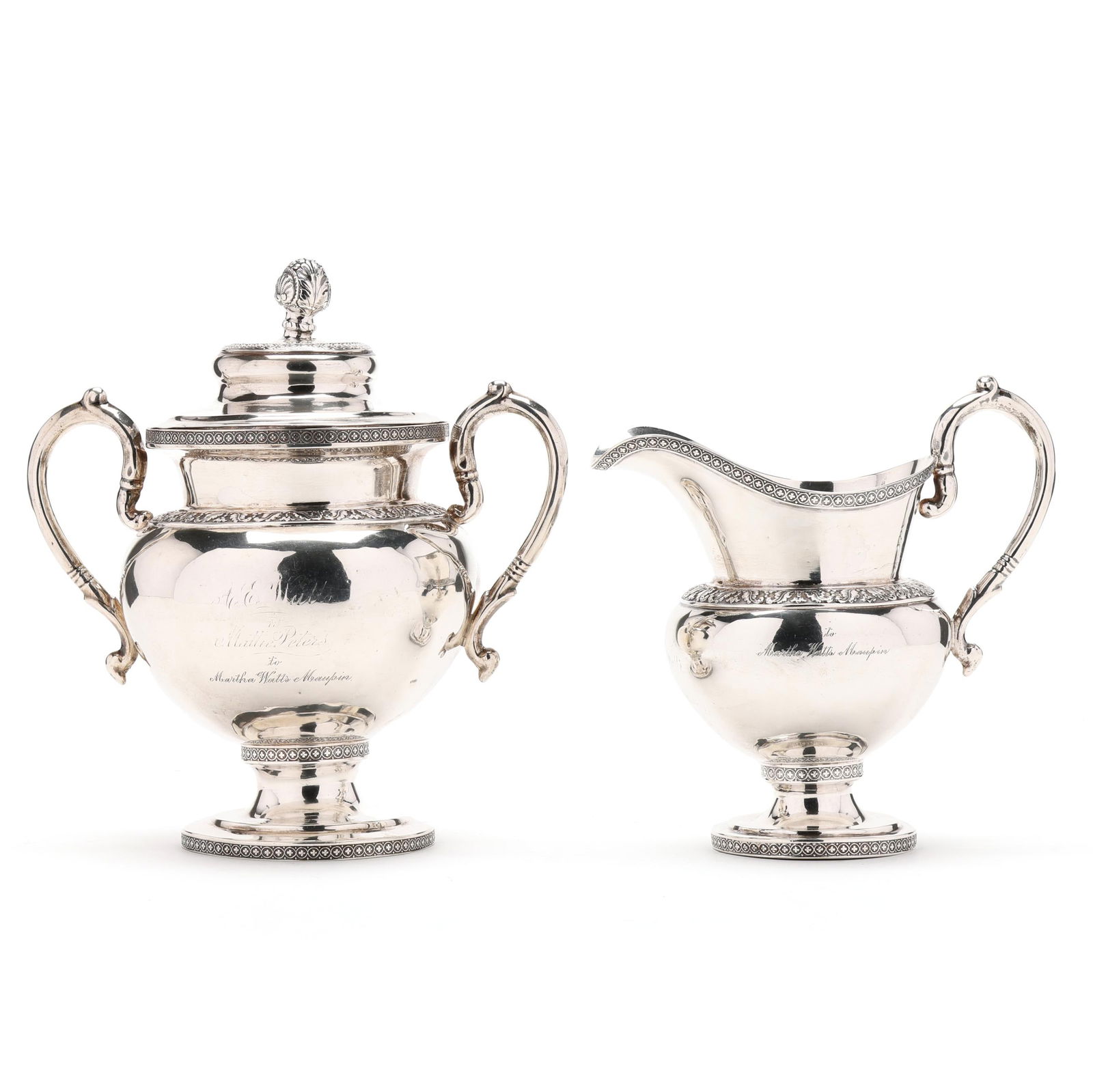 Coin Silver Creamer and Covered Sugar Bowl, Mark of Garret Eoff: Coin Silver Creamer and Covered Sugar Bowl, Mark of Garret EoffNew York, circa 1805-1845, featuring rosette decoration to the rim and foot, foliate decoration to the shoulders, the sugar surmounted by