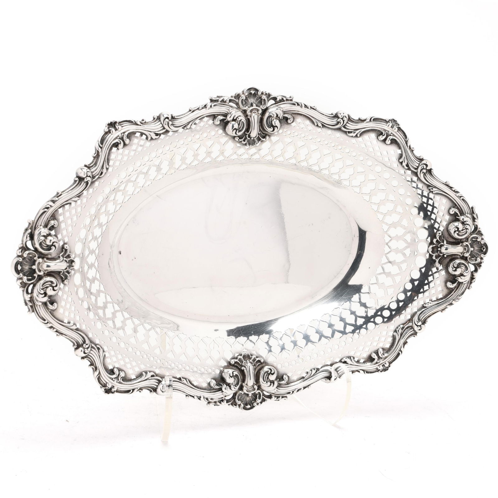 Black, Starr & Frost Sterling Silver Bread Basket: Black, Starr & Frost Sterling Silver Bread BasketNew York, early 20th century, pattern number D4826, ovoid form featuring a reticulated flange and rocaille scrolled shell border, not monogrammed. 9 x