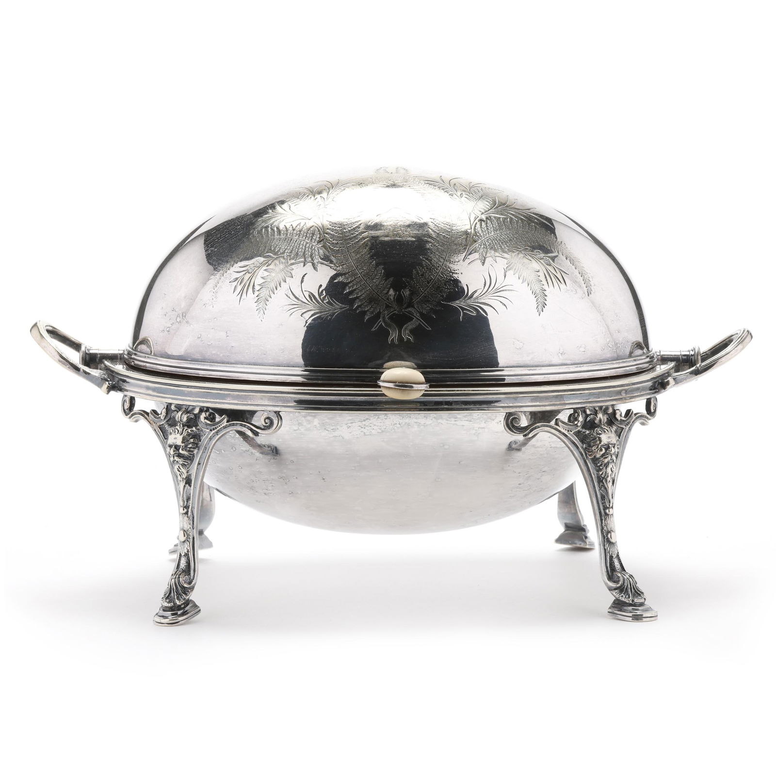 English Silver-Plated Breakfast Server: English Silver-Plated Breakfast Server late 19th century, featuring a rotating domed lid with bone handle, lions mask knees, and shell over hoofed feet, with an ornately engraved foliate wreath and