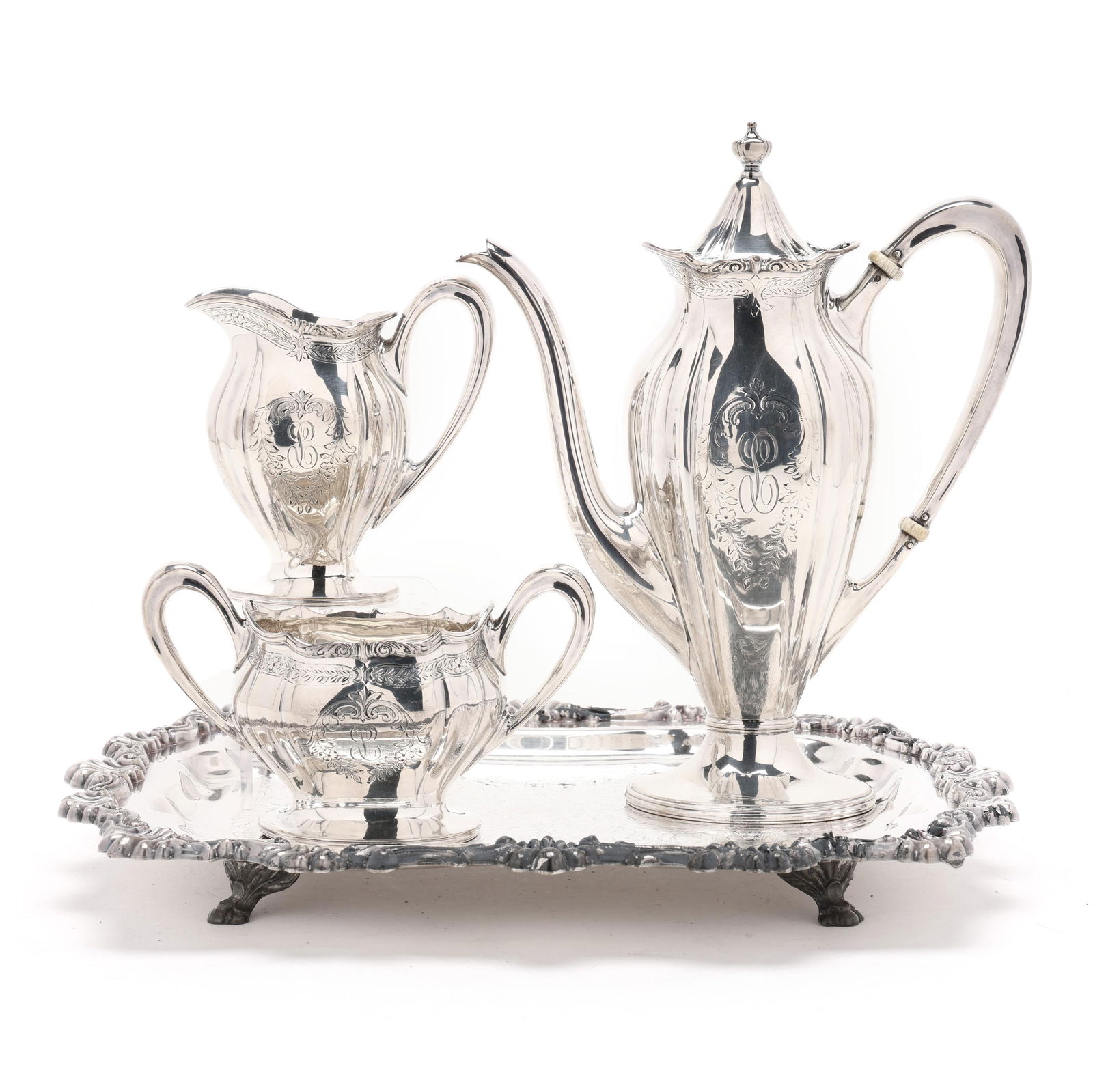 Graff, Washbourne, & Dunn Sterling Silver Coffee Service: Graff, Washbourne, & Dunn Sterling Silver Coffee Servicepattern number 3712/57H, retail mark of Bailey, Banks, & Biddle Co., featuring hand-engraved foliate decoration, and a uniform script "L" monogr