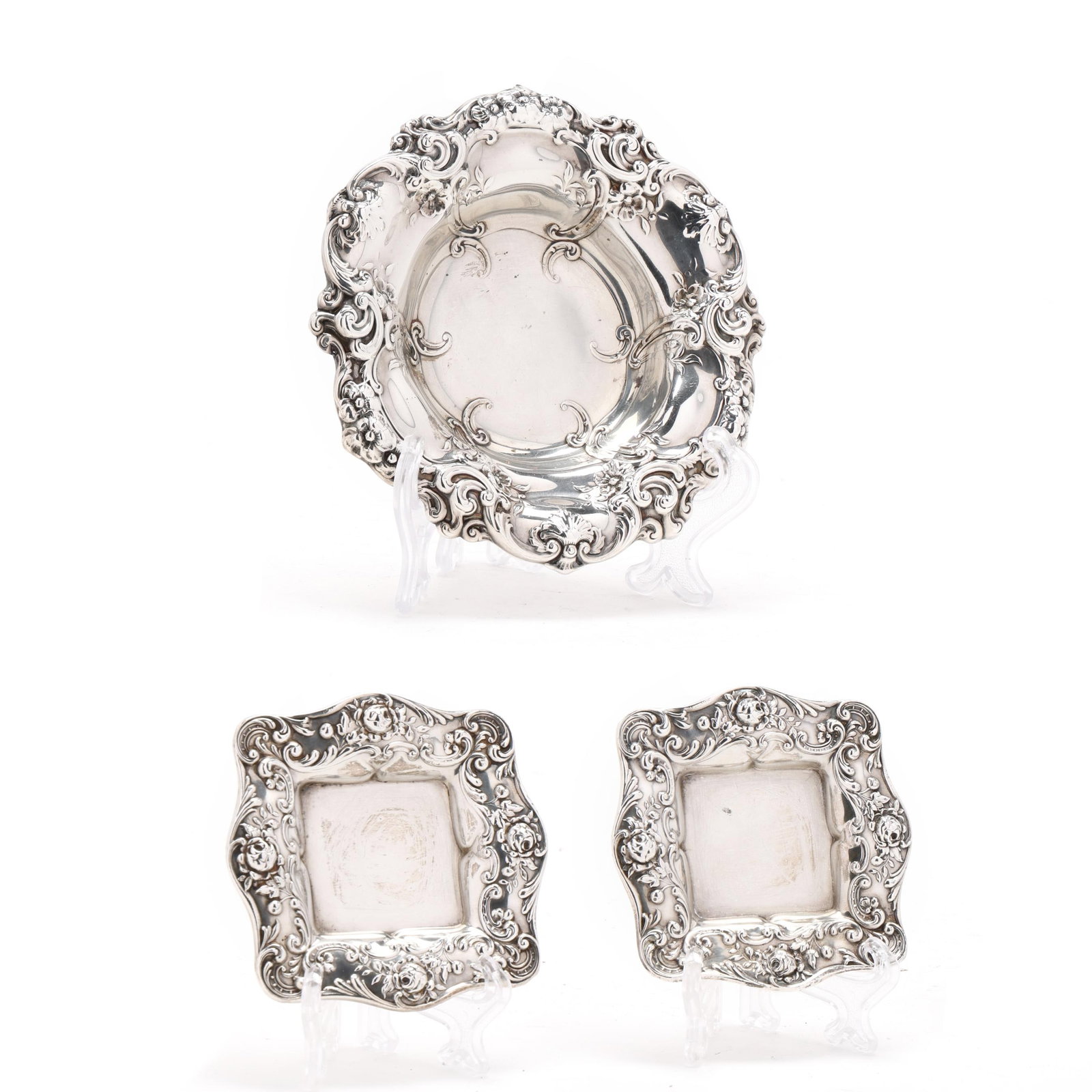 Three Gorham Sterling Silver Dishes: Three Gorham Sterling Silver Dishesincludes a bon bon bowl, pattern number 816 (5 1/2 in.); and (2) butter pats, pattern number 323 (3 1/4 x 3 1/4 in.); all with similar rocaille decoration, not monog