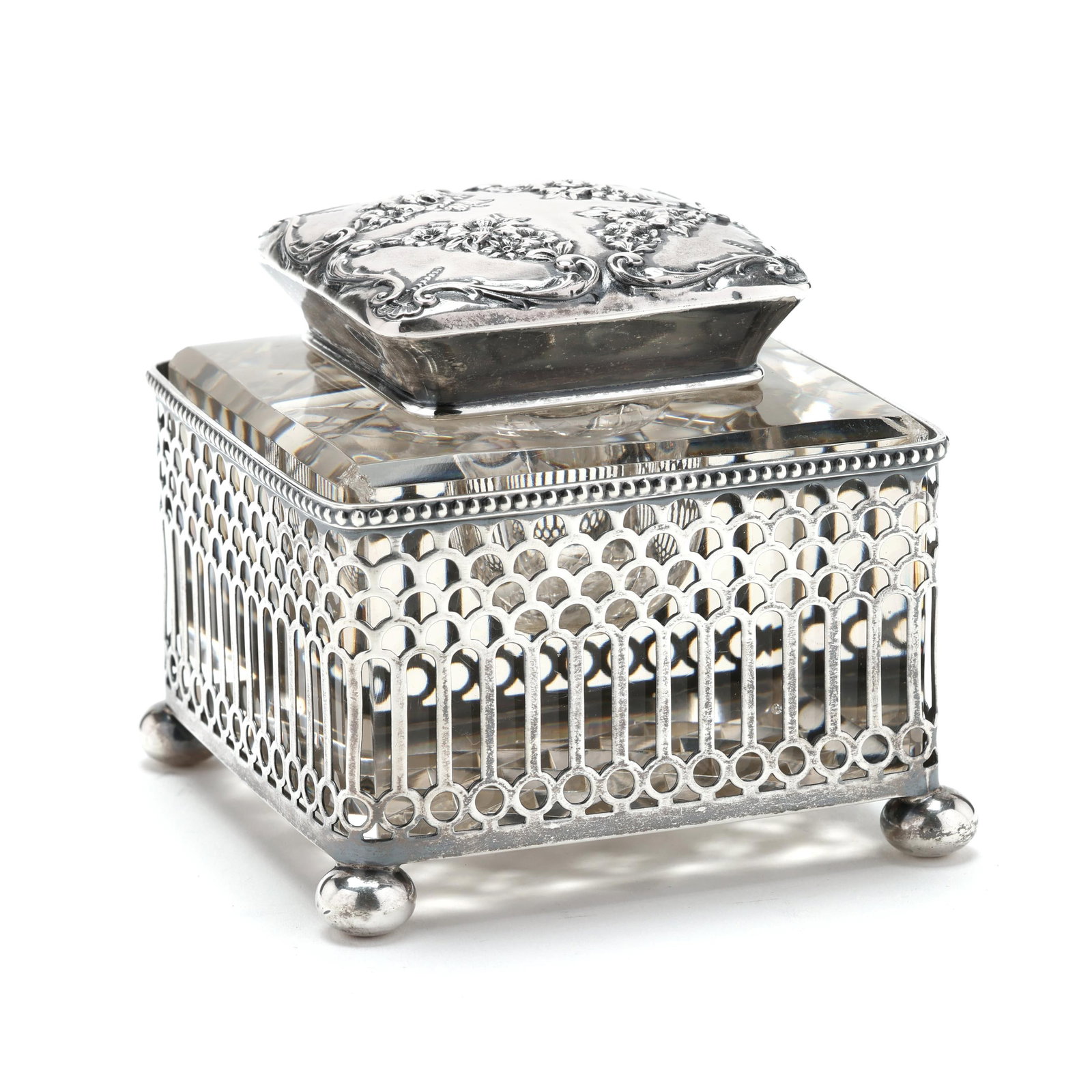 Gorham Sterling Silver and Crystal Inkwell: Gorham Sterling Silver and Crystal Inkwell last quarter of 19th century, pattern numbers S785 and S6249, featuring a fish-scale reticulated body over four ball feet; a repousse lid with floral