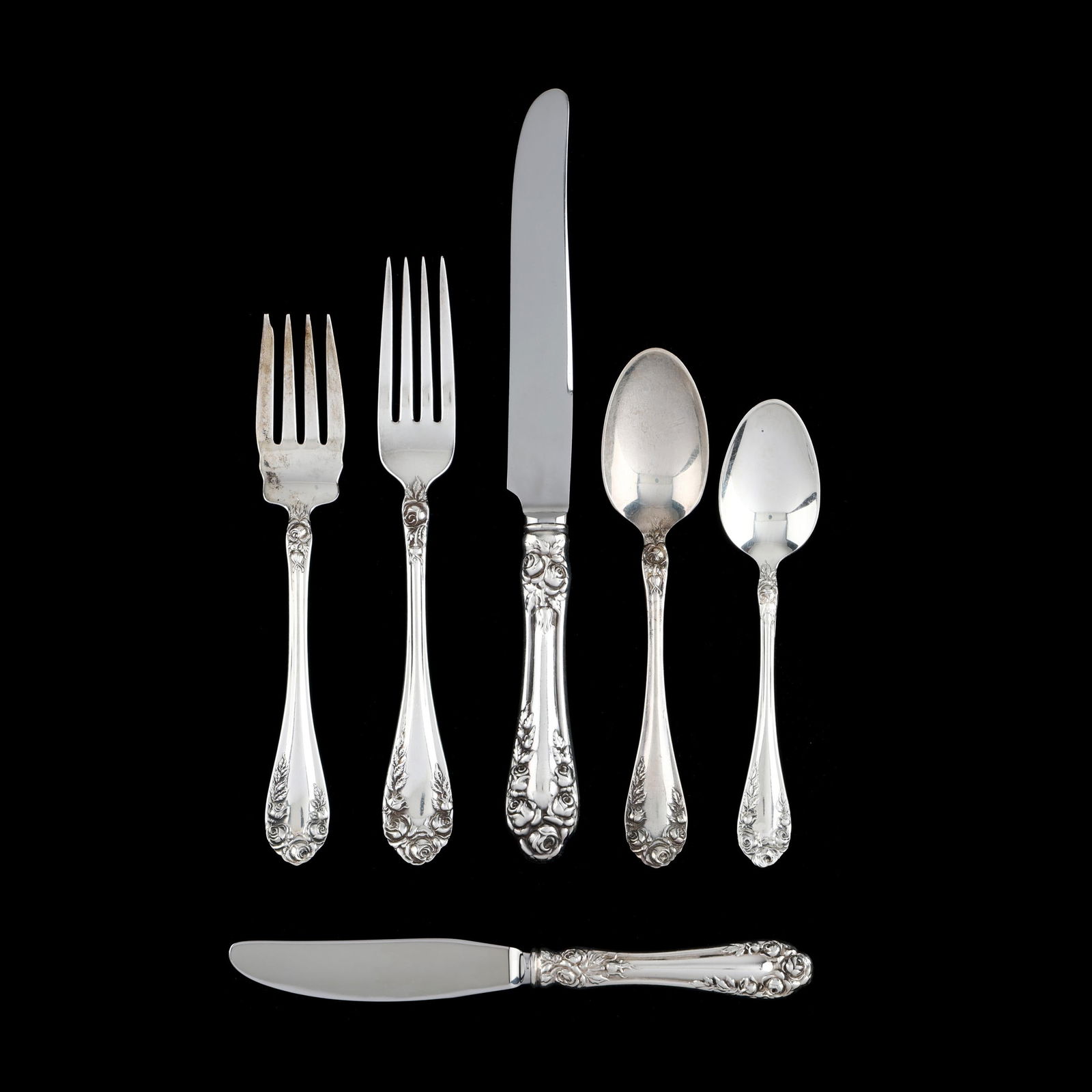Northumbria Normandy Rose Sterling Silver Flatware Service: Northumbria Normandy Rose Sterling Silver Flatware Service (65) pieces to include: (8) dinner knives (9 in.); (8) dinner forks (7 in.); (8) salad forks (6 1/4 in.); (8) teaspoons (5 7/8 in.); (8)