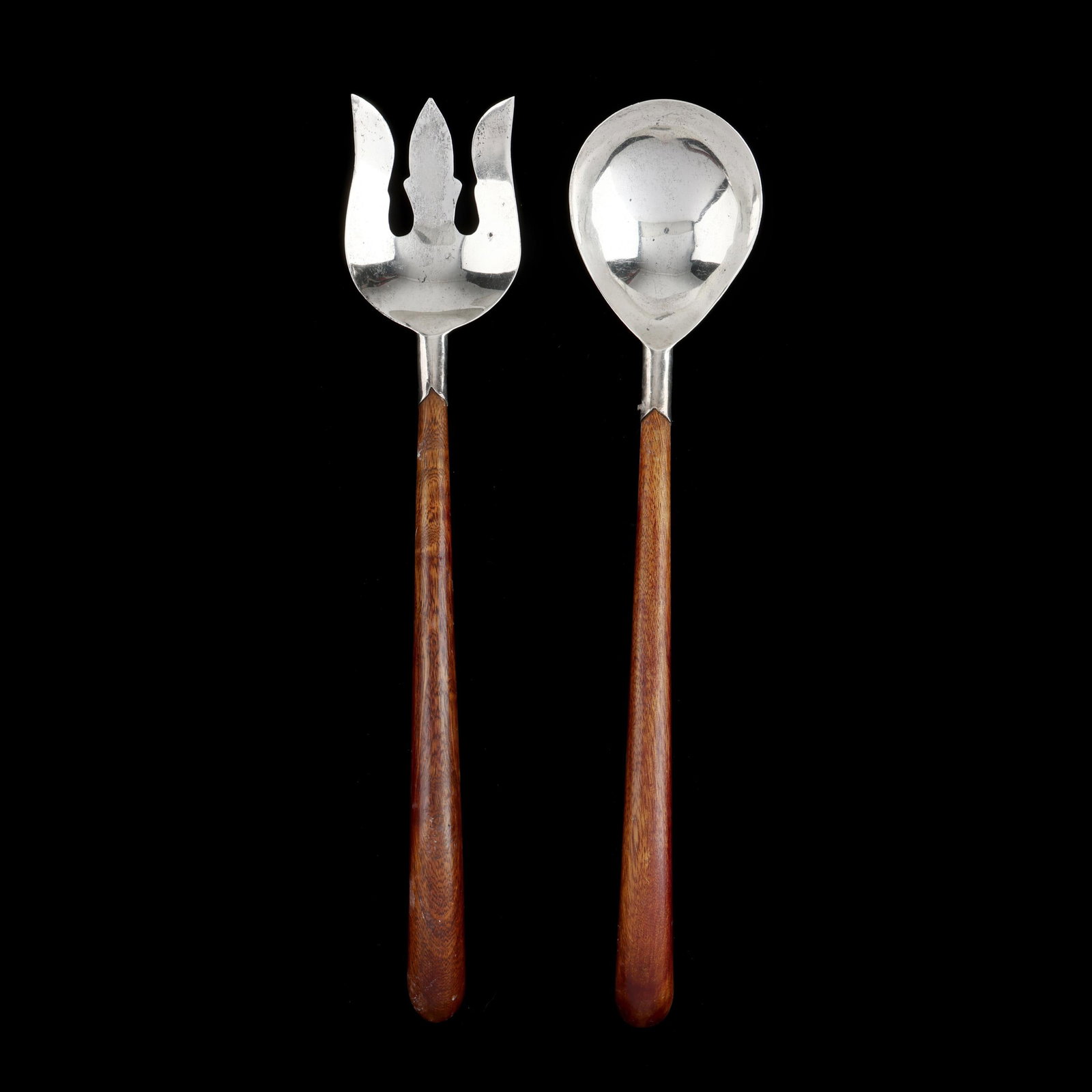 Sterling Silver and Wood Salad Serving Set: Sterling Silver and Wood Salad Serving Set each marked "925 / Sterling," with shaped walnut handles, not monogrammed. 13 1/2 in. Additional high-resolution photos are available at