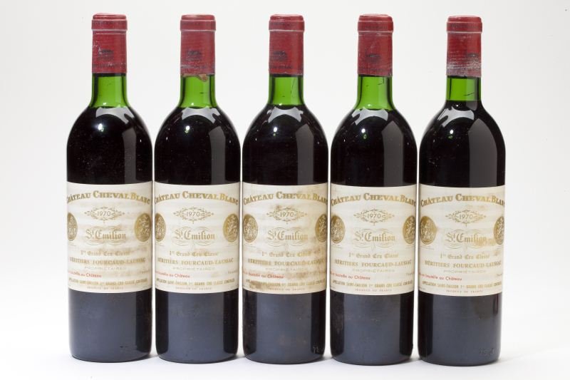 Chateau Cheval Blanc: Chateau Cheval Blanc "...Deep ruby center with a garnet edge, and light stewed tomato, tobacco and orange peel aromas; full-bodied, with velvety tomato and tobacco flavors and a lovely, silky finish."