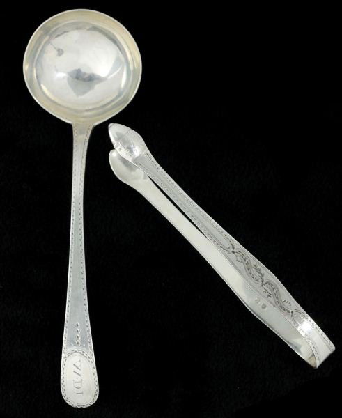Two Silver Servers by Hester Bateman: Two Silver Servers by Hester Batemanthe first a sauce ladle with London (1786) hallmarks, bright cut engraving and monogram to handle (7.25 in.; 1.6 troy oz.); the second a pair of sugar tongs with Lo