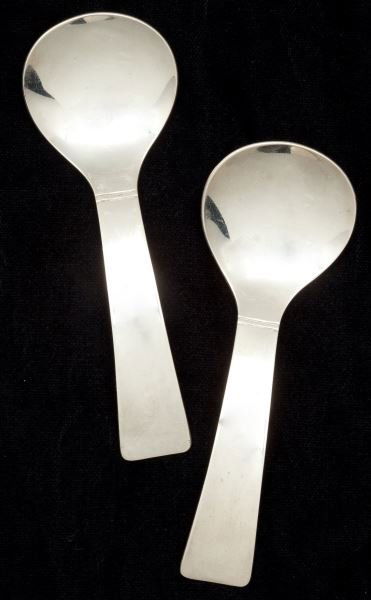 Pair of Allan Adler Sterling Silver Serving Spoons: Pair of Allan Adler Sterling Silver Serving Spoonsin his admired mid-century style "Sunset" pattern, hand-wrought, marked on the reverse.5 1/8 in.2.3 total troy oz.From the Estate of Leanora Hornblow,