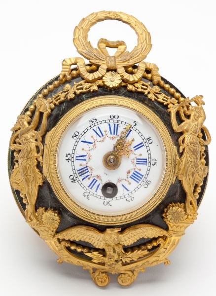 Fine French Cartel Clock, Black Starr & Frost: Fine French Cartel Clock, Black Starr & Frostenameled face with remnant "NE" above six o'clock, key wind, set in shaped green marble with ornate ormolu mount featuring goddesses, spread wing eagle and