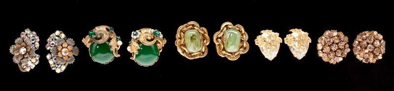 Five Pairs of Earclips, Miriam Haskell: Five Pairs of Earclips, Miriam HaskellAmerican, circa 1950s-1960s, the first set with a large pear shaped rhinestone with floral overlay, the second pair set with nugget form glass tones with gold ton