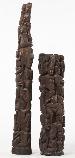 Two Makonde Carved Ebony "Tree of Life" (Ujamaa): Two Makonde Carved Ebony "Tree of Life" (Ujamaa)finely carved sculptures representing the survival mechanism of an African village -with men, women, and children supporting each other.36.25 in. and 24