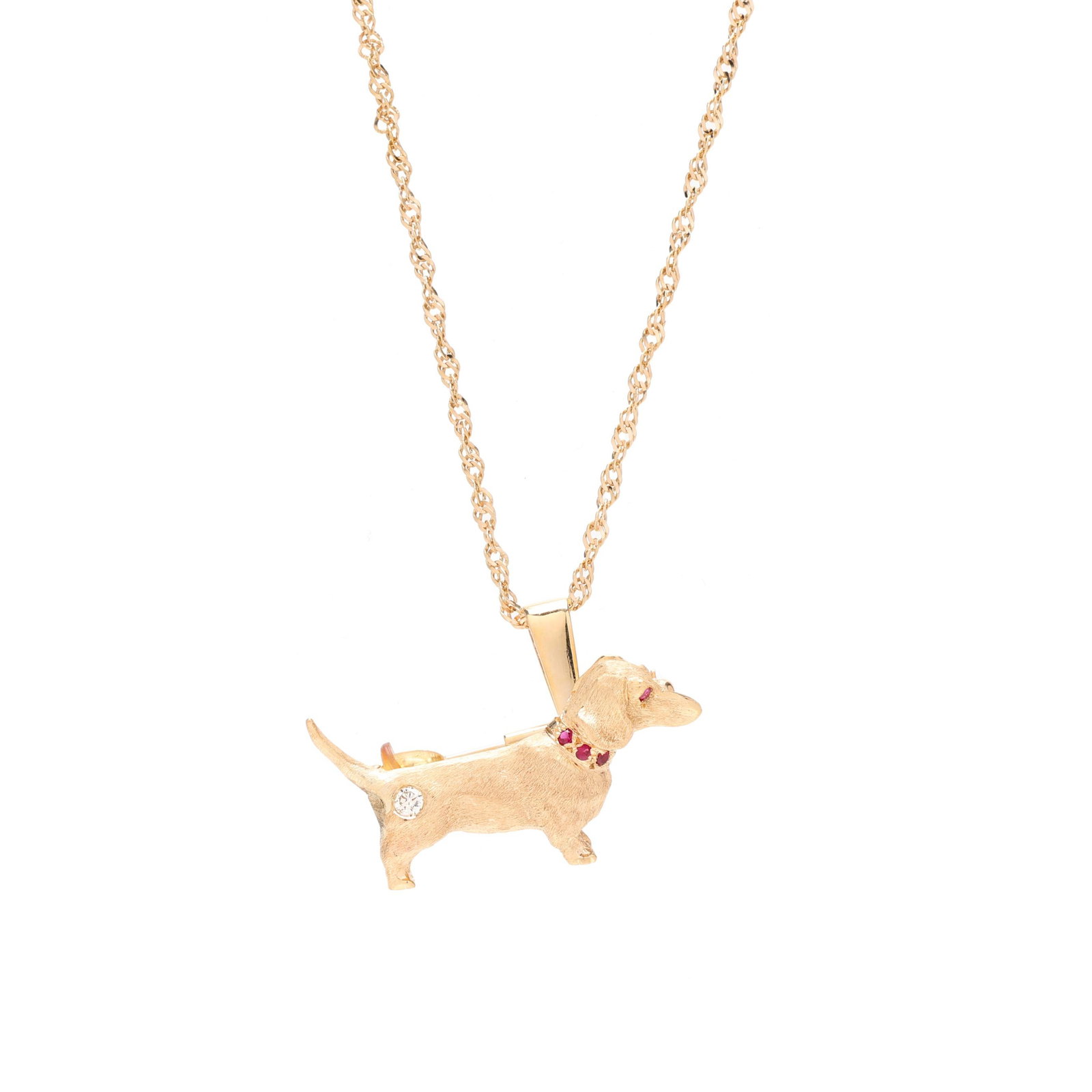 Gold Dachshund Pendant / Brooch, Henry Danker with Chain: Gold Dachshund Pendant / Brooch, Henry Danker with Chainthe finely detailed dachshund figure set with a full cut round diamond and with ruby set collar and eye, completed with a single locking pin ste