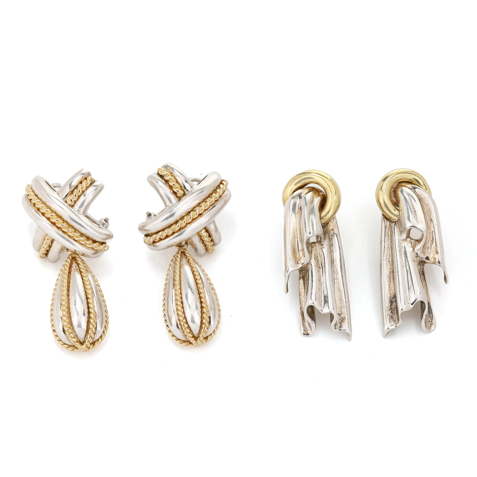 Two Pairs of Silver and Gold Earrings, Tiffany & Co.: Two Pairs of Silver and Gold Earrings, Tiffany & Co.to include: a pair of earrings in the design of a ring with draped material, completed with posts and omega clip backs, stamped Tiffany & Co. / 925