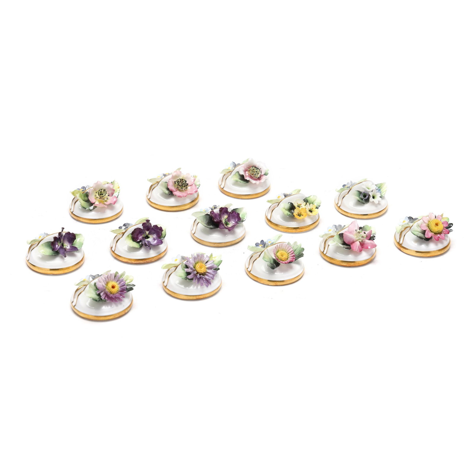 (13) Royal Crown Derby China Place Card Holders: (13) Royal Crown Derby China Place Card HoldersEngland, late 20th century, with individually painted and molded flowers and gilt trim, marked with company backstamp and "XXXIX" to underside. Each appr