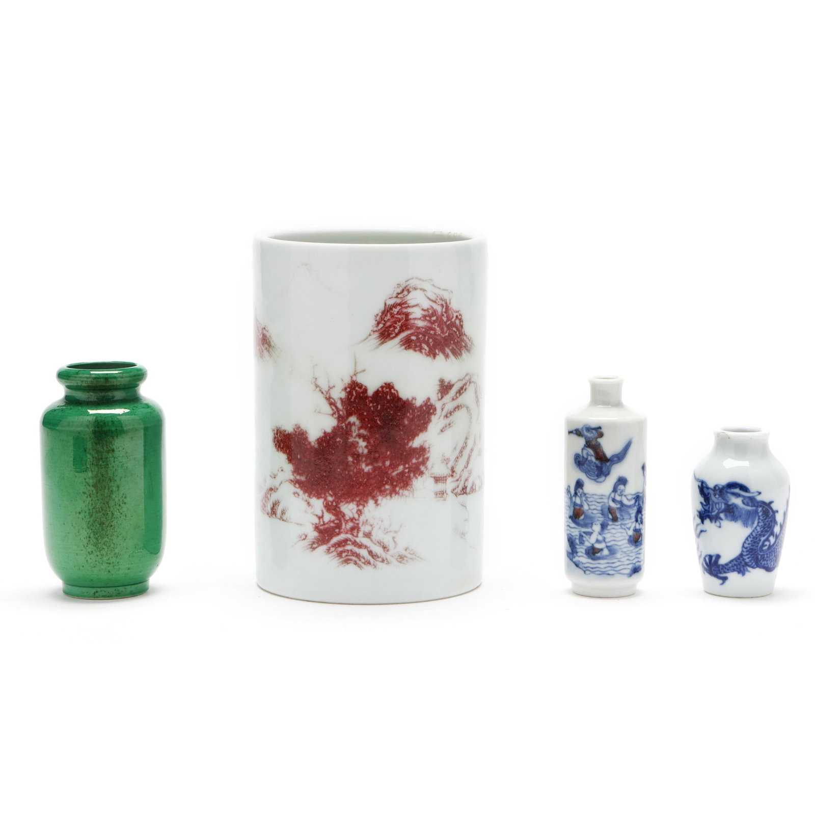 A Group of Chinese Scholar Porcelain: A Group of Chinese Scholar Porcelain late Qing dynasty or early Republic period, includes a porcelain brush pot with copper red decoration of a mountainous landscape, unmarked (5 1/4 in., 3 1/2 in. di