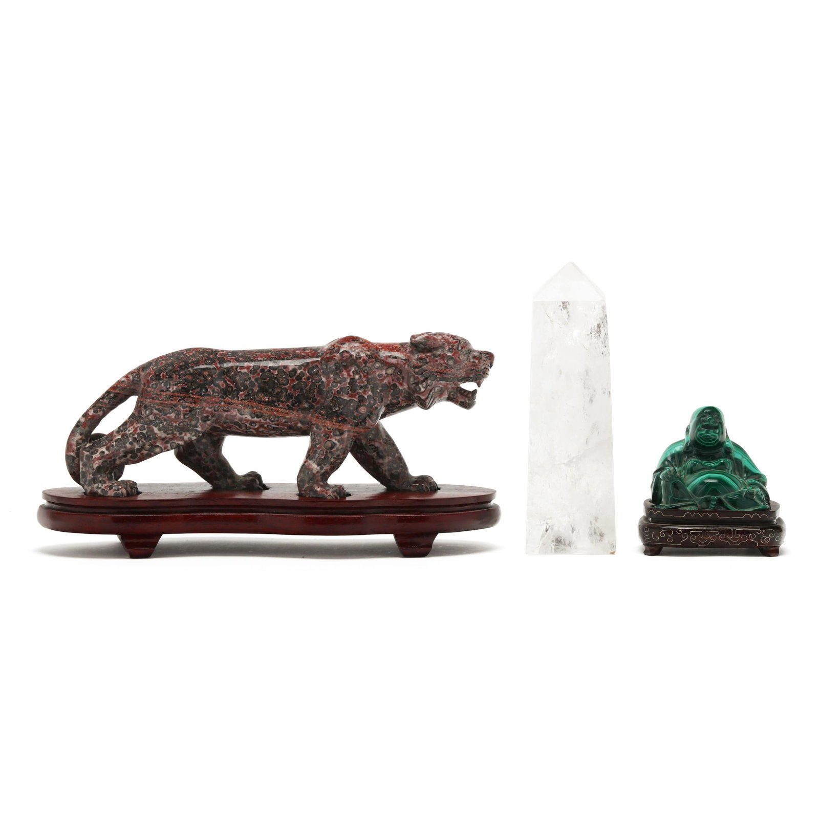 Three Carved Stone Decorative Accessories: Three Carved Stone Decorative Accessoriesincluding a malachite seated buddha with conforming inlaid wood stand (3 3/4 x 3 3/4 x 2 3/4 in.); a leopard jasper big cat (likely a leopard) with conforming