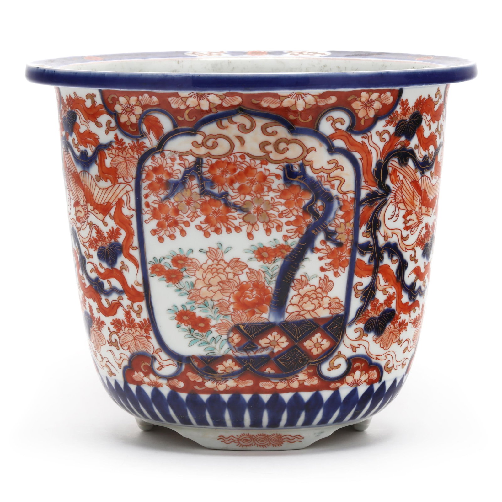 A Large Japanese Imari Porcelain Jardiniere Planter: A Large Japanese Imari Porcelain Jardiniere Planter Meiji period (1868-1912), late 19th century, finely decorated porcelain jardiniere in the Imari palette of iron red, underglaze cobalt blue, and gil
