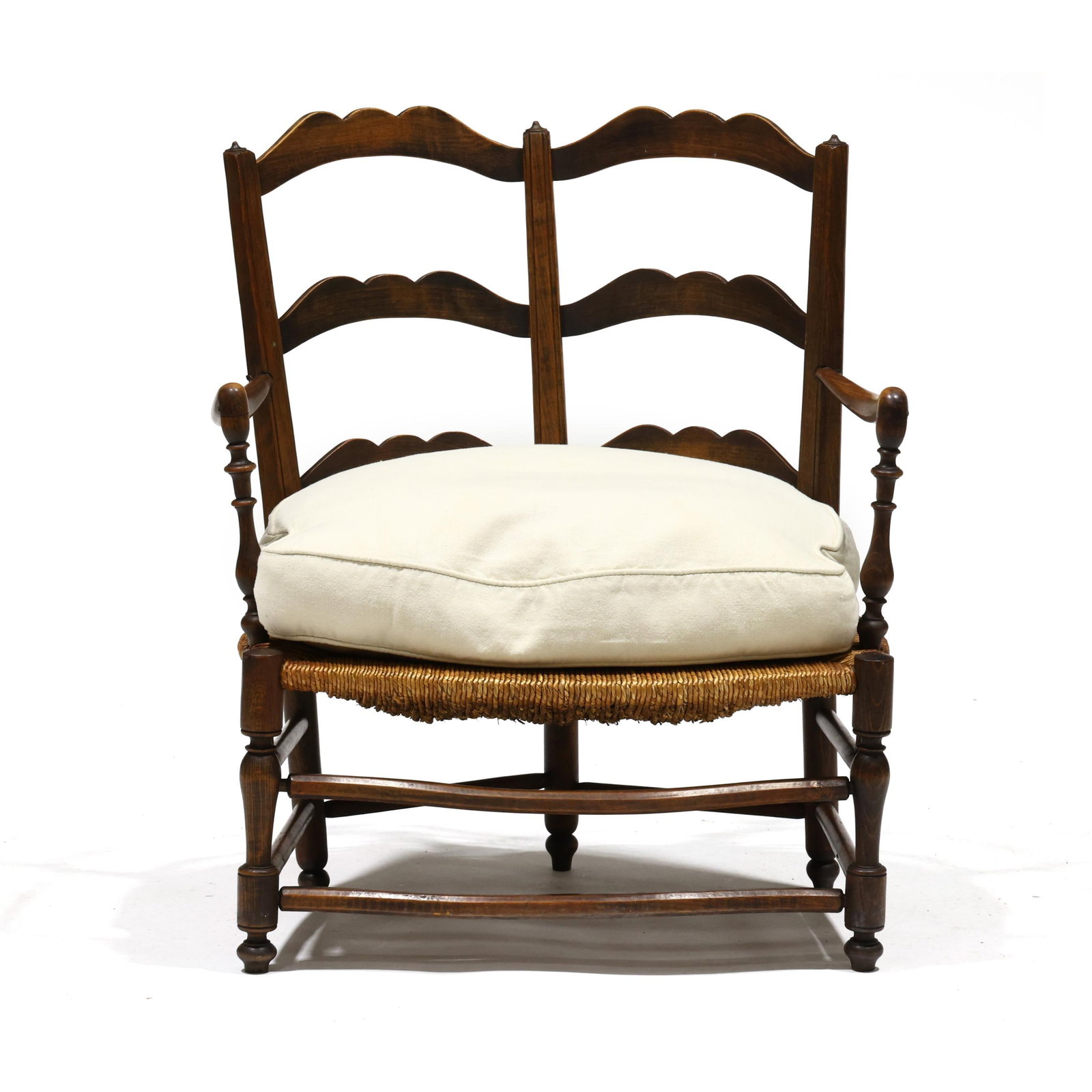 French Provincial Fruit Wood Double Back Armchair: French Provincial Fruit Wood Double Back Armchair late 20th century, shaped ladder backs, rush seat with custom down filled cushion, turned legs and conforming stretcher base. 34 x 28.5 x 23 in. Addit