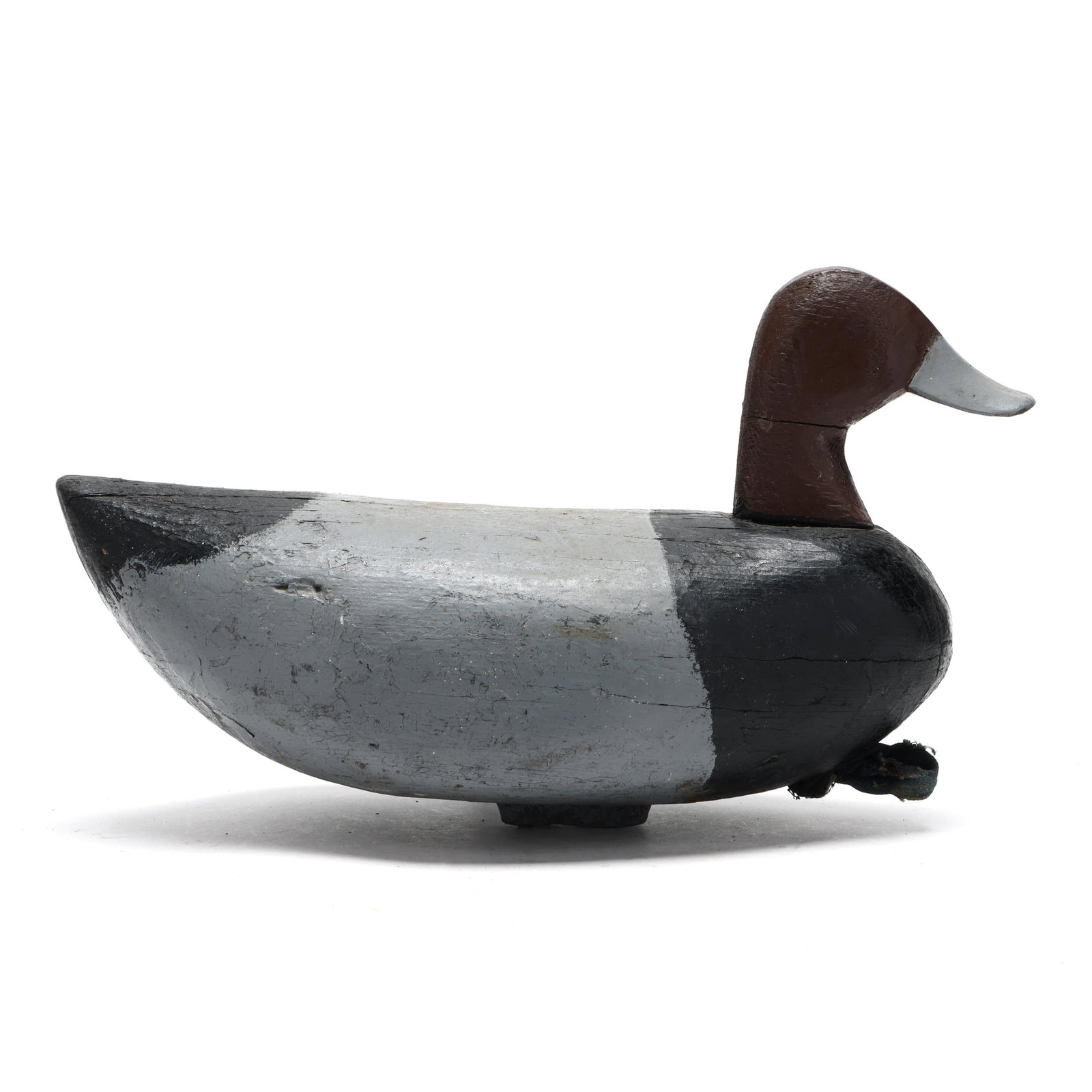 Luther Fulcher (NC, 1903-1935), Redhead: Luther Fulcher (NC, 1903-1935), Redhead Ocracoke, North Carolina, circa 1920s, carved and painted wood. Length 14.75 in. x 9 x 7 Additional high-resolution photos are available at www.lelandlittle.com