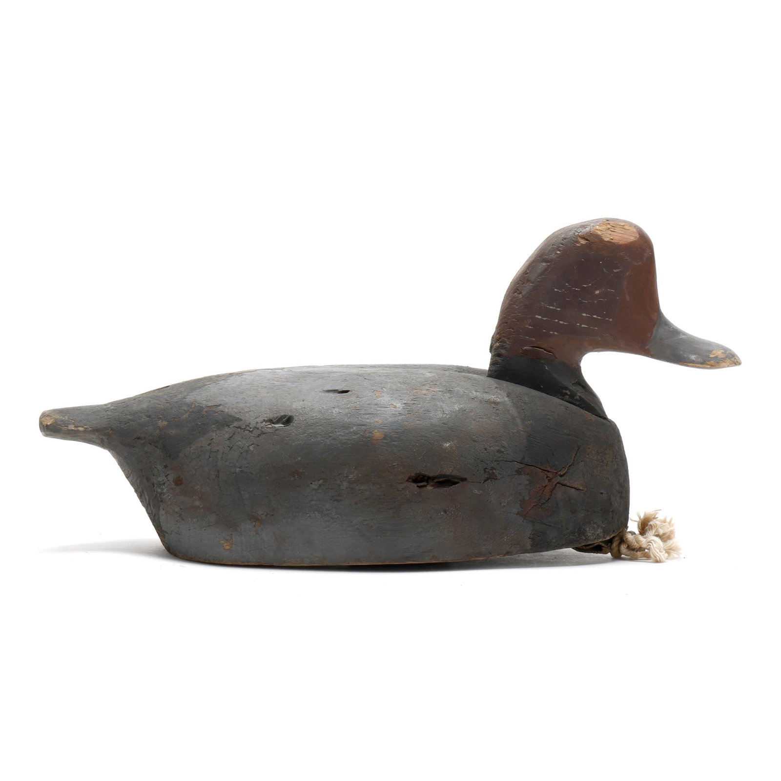 Dan Garrish (NC, 1879-1955), Redhead: Dan Garrish (NC, 1879-1955), Redhead Ocracoke, North Carolina, circa 1930s, carved and painted wood. Length 15 in. x 7.75 x 7 Additional high-resolution photos are available at www.lelandlittle.com