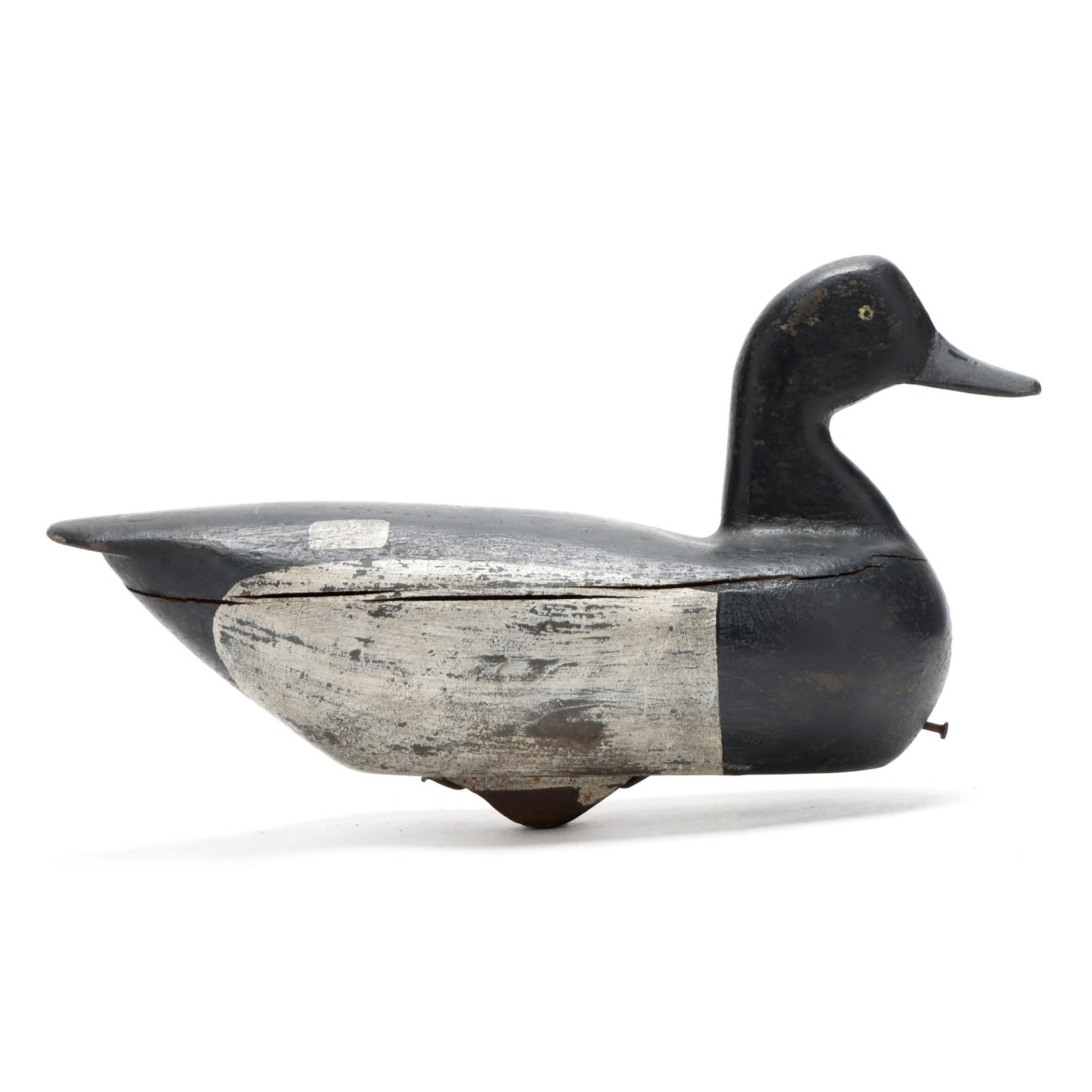Joe Hayman (NC, 1896-1974), Bluebill: Joe Hayman (NC, 1896-1974), Bluebill Churches Island, North Carolina, circa 1950s, carved and painted wood. Length 17 in. A slight neck shelf From the Harold Grimstead rig. Additional high-resolution 