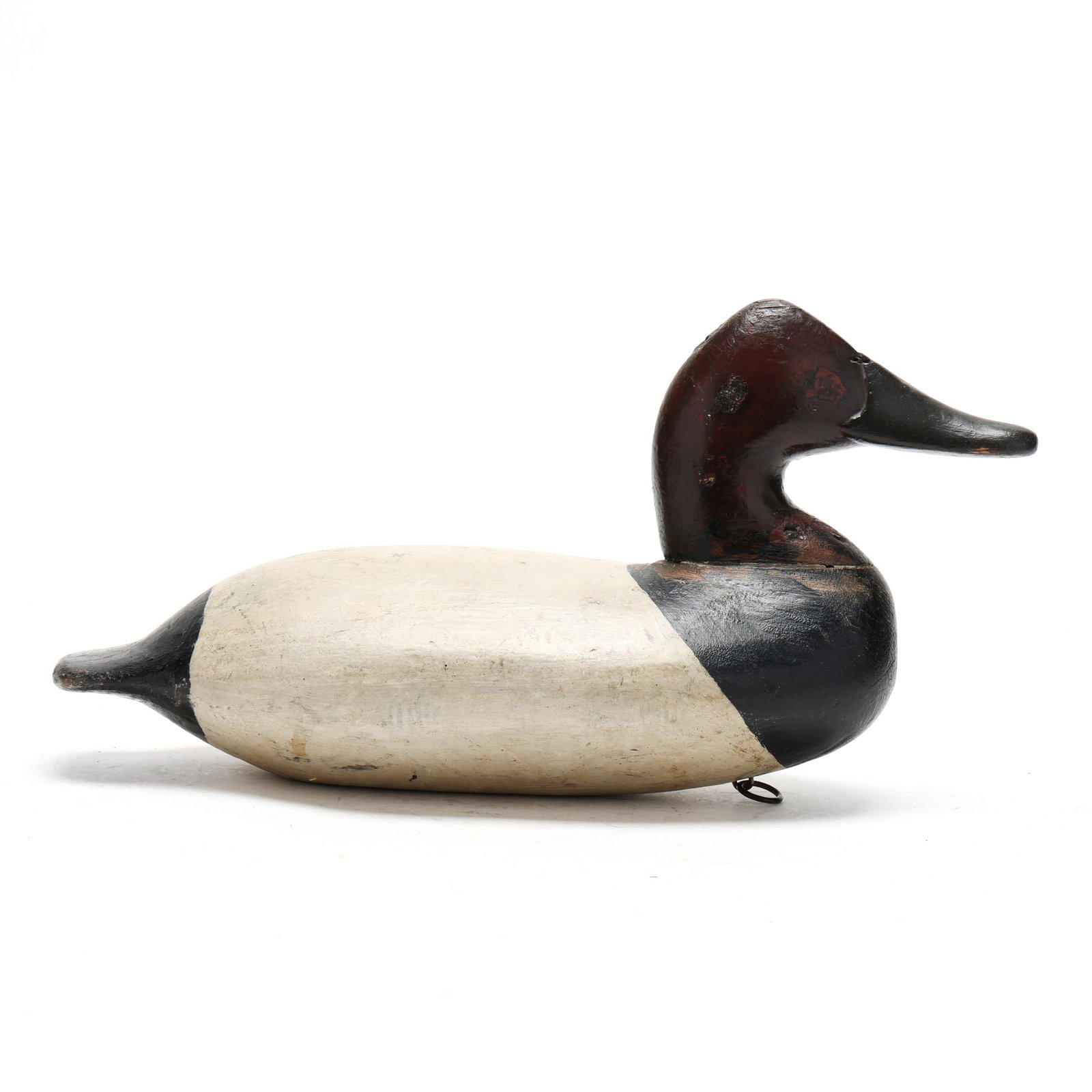 Will "Snake" Heverin (MD, 1860-1951), Canvasback: Will "Snake" Heverin (MD, 1860-1951), Canvasback Charlestown, Maryland, circa 1900, carved and painted wood. Length 15.5 in. x 7 x 6.5 Additional high-resolution photos are available at www.lelandlitt