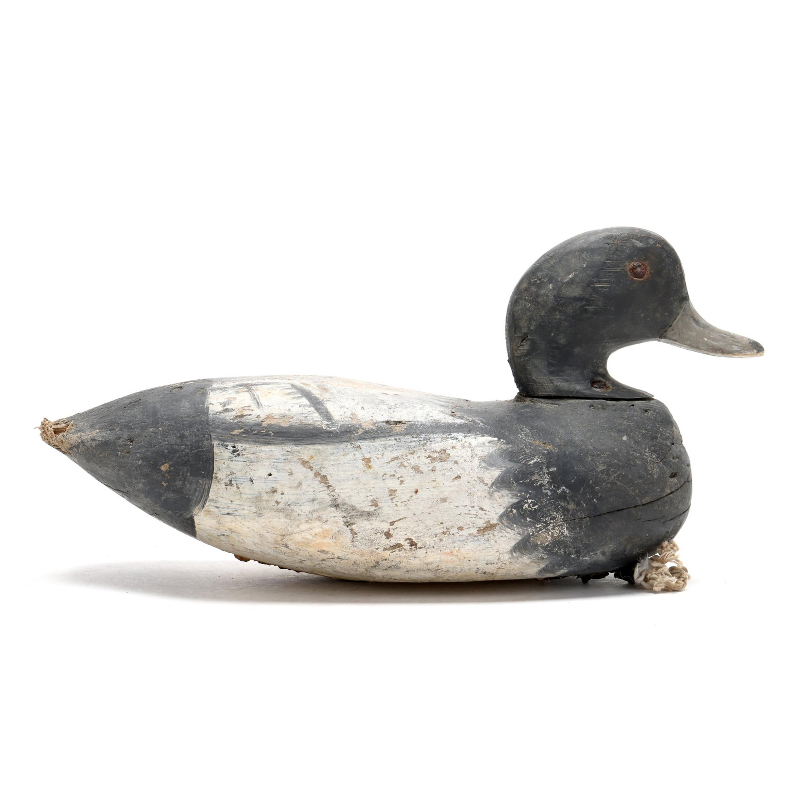 Ira Hudson (VA, 1876-1949), Bluebill: Ira Hudson (VA, 1876-1949), Bluebill Chincoteague, Virginia, circa 1930s, carved and painted wood, tack eyes. Length 14 in. x 7.5 x 6 Additional high-resolution photos are available at www.lelandlittl