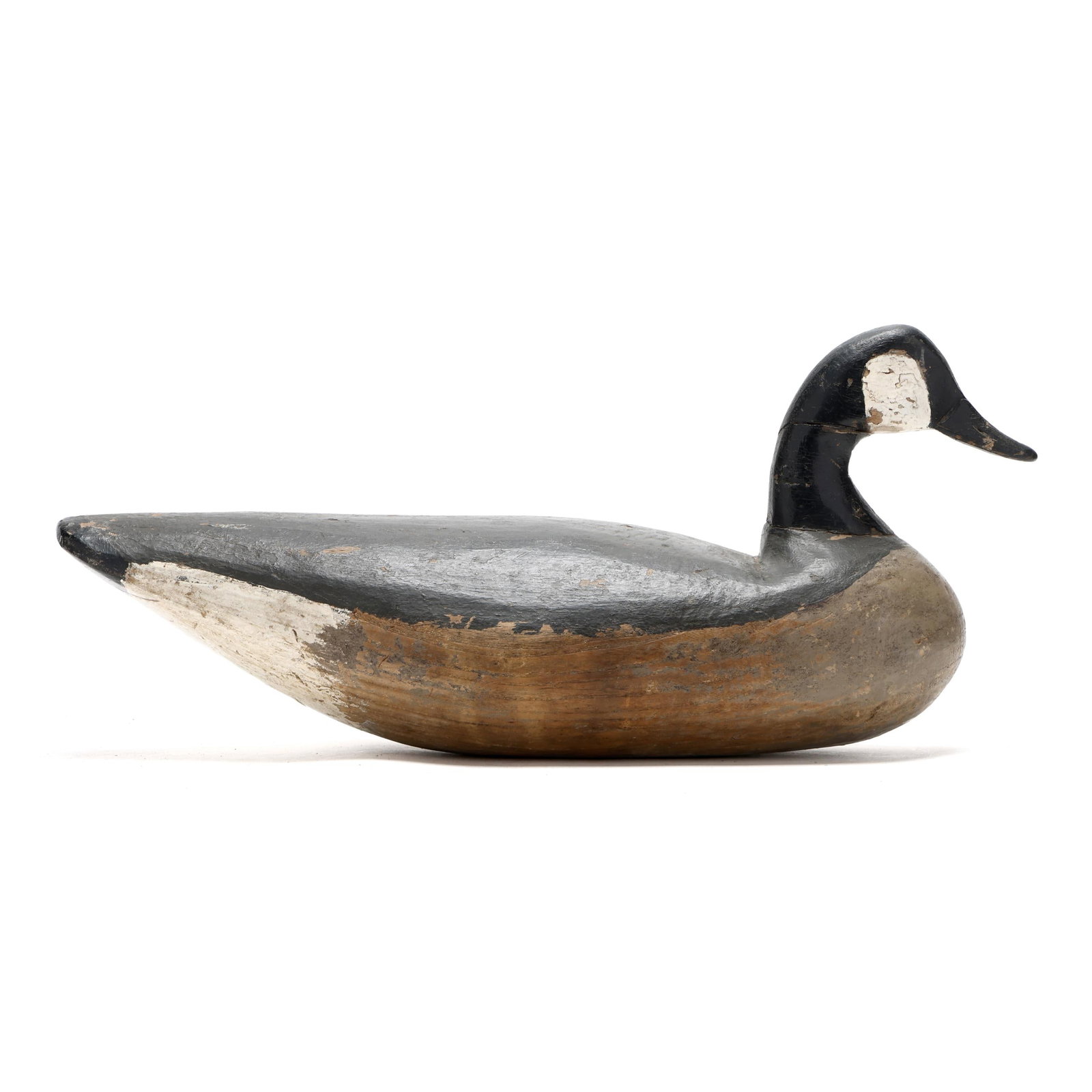 Doug Jester (VA, 1876-1961), Goose: Doug Jester (VA, 1876-1961), Goose Chincoteague, Virginia, circa 1930s, carved and painted wood. Length 23.5 in. x 11 x 9 A similar example is published on page 97 of Southern Decoys of Virginia and t