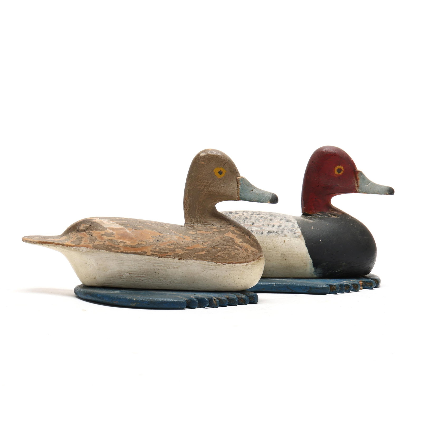 Chales Clark (VA, 1869-1947), Pair of Miniature Redheads: Chales Clark (VA, 1869-1947), Pair of Miniature Redheads Chincoteaque, Virginia, circa 1930s, carved and painted wood, mounted to painted wood base representing water. Length 11 in. A very rare compos
