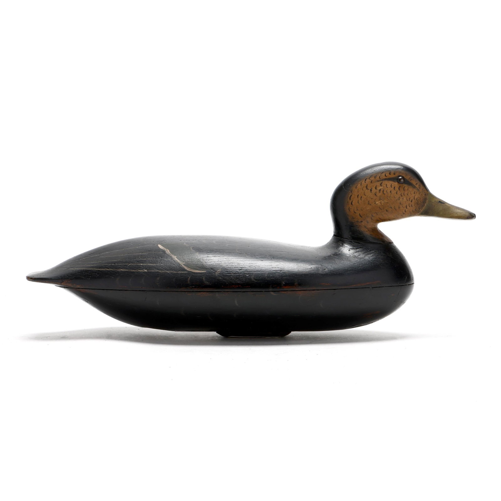 Early Blair School Black Duck: Early Blair School Black Duck Philadelphia, Pennsylvania, circa 1890, carved and painted wood, tack eyes, branded SEIDEL. Length 16.5 in. x 6.5 x 6.5 Additional high-resolution photos are available at