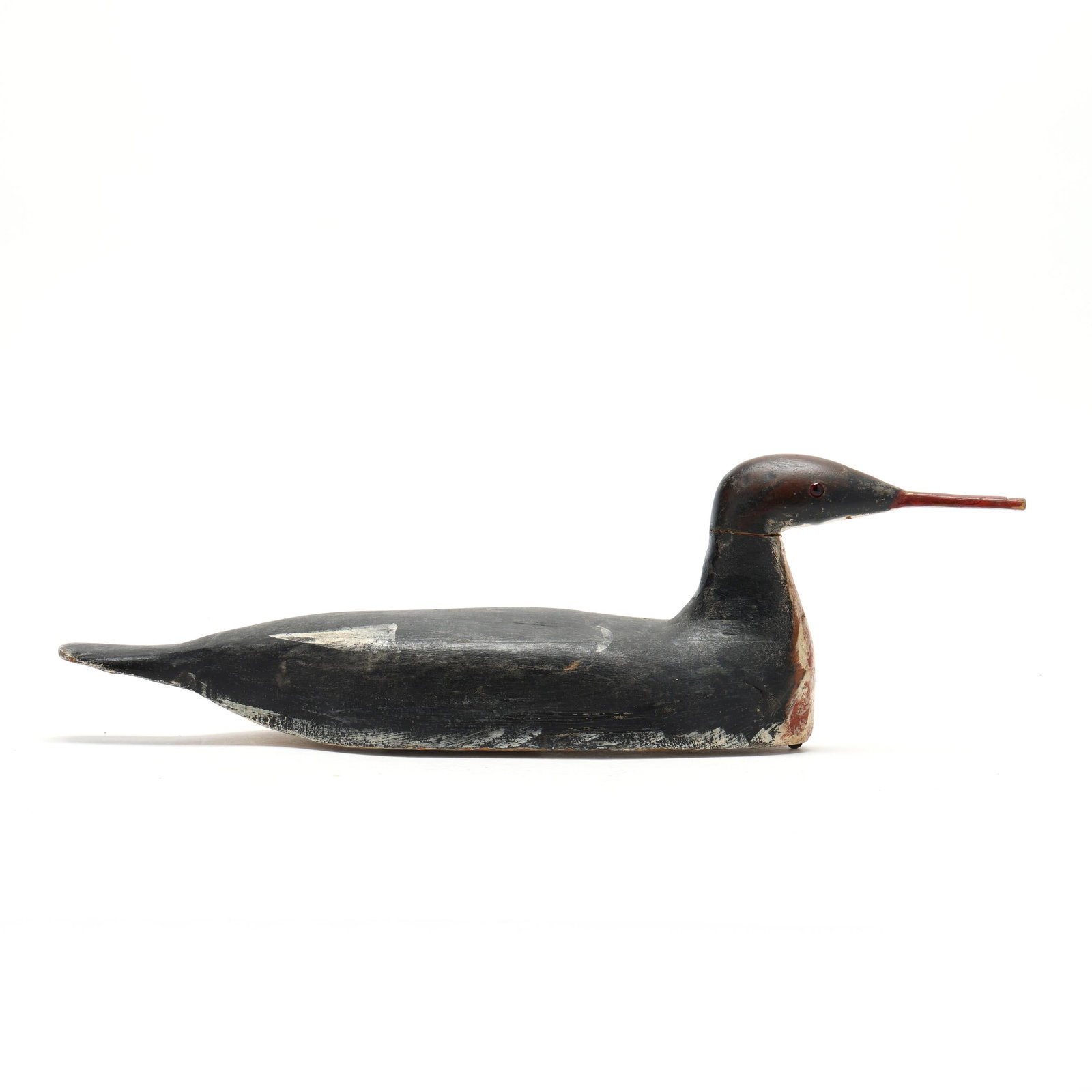 Steve Nickerson (MA, 1947-2020), Merganser: Steve Nickerson (MA, 1947-2020), Merganser Marstons Mills, Massachusetts, circa 1960s, carved and painted wood, glass eyes, painted S.L.N. brand. Length 19 in. x 6 x 6 Additional high-resolution