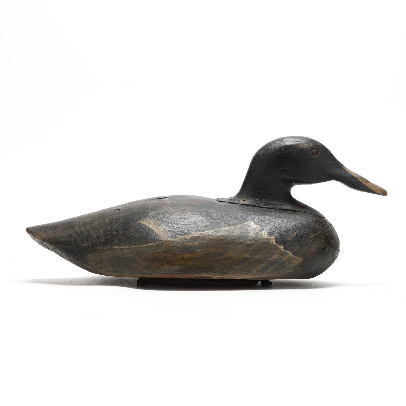 Early Maine White-Winged Scoter: Early Maine White-Winged Scoter Eastern Shore of Maine, circa 1950s, carved and painted wood, tack eyes, horse shoe ballast. Length 18 in. x 7.5 x 8.5 Inletted head Additional high-resolution photos a
