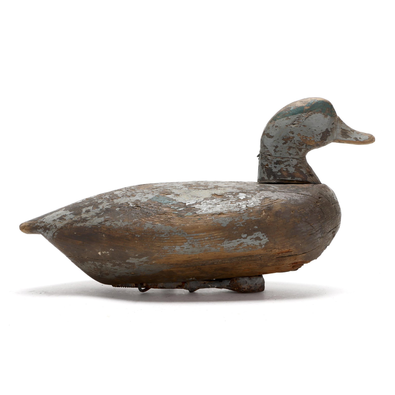 Early Currituck Widgeon: Early Currituck Widgeon Currituck, North Carolina, circa 1920s, carved and painted wood, unique tool ballast. Length 15 in. x 8 x 7 Collected from an old shed in Coinjock, North Carolina. Additional h