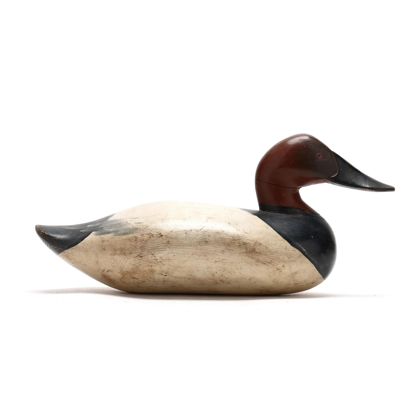 Early Upper Bay Canvasback: Early Upper Bay Canvasback Havre de Grace, Maryland, circa 1960s, carved and painted wood. Length in. 16 x 7.5 x 7 From the Estate of the late Mr. John L. Stone and Mrs. Josephine T. Stone,