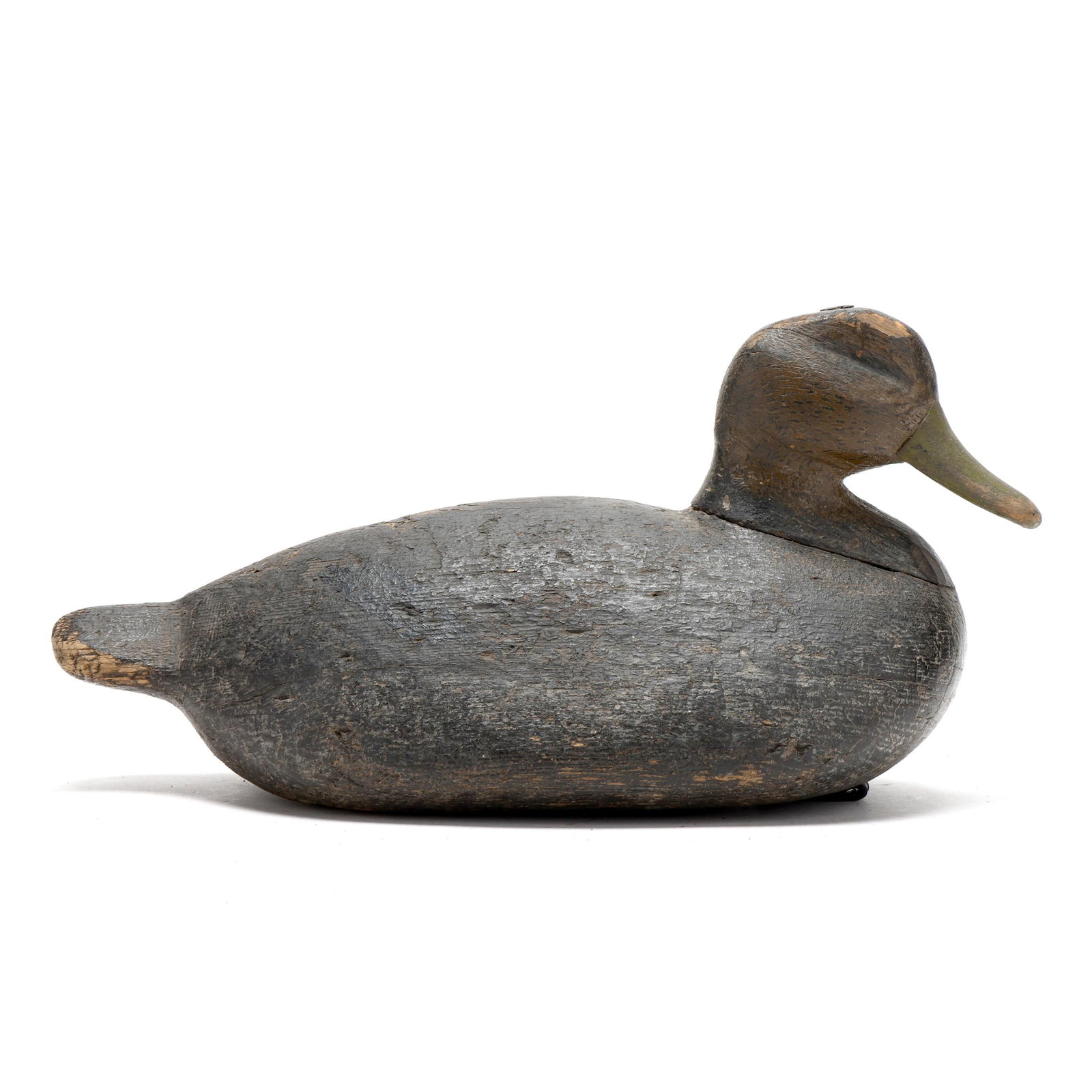 Early Long Island Black Duck: Early Long Island Black Duck Long Island, New York, circa 1910, carved and painted wood. Length 14.5 in. x 7.75 x 7.5 Carved brow in the forehead. Additional high-resolution photos are available at ww