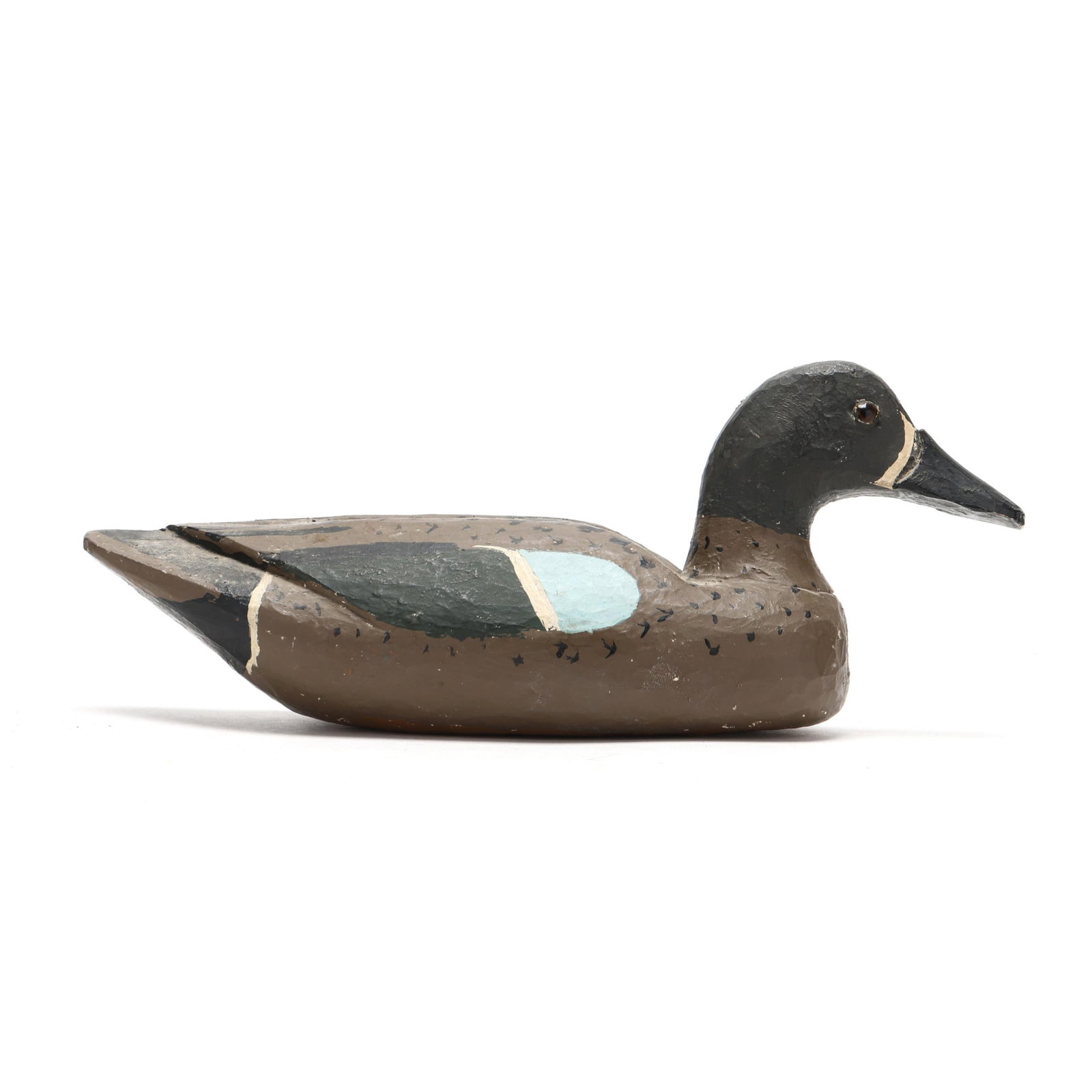 Early Louisiana Green Winged Teal: Early Louisiana Green Winged Teal Southern Louisiana, circa 1940s, carved and painted wood, glass eyes. Length in. 11.5 x 5 x 4.5 in. An extremely well carved decoy. Additional high-resolution photos 