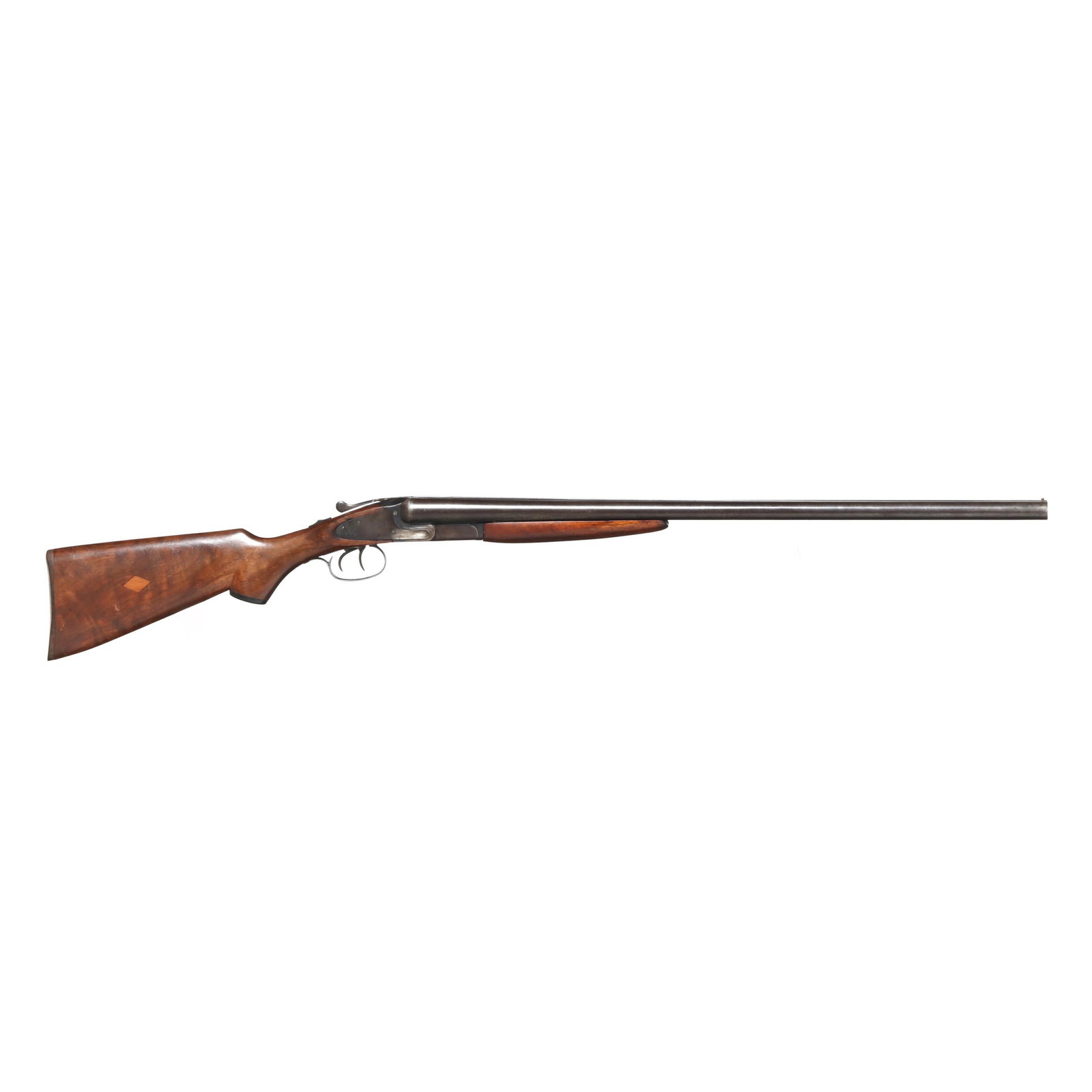 L. C. Smith 0 Grade 12ga Sidelock Doublegun: L. C. Smith 0 Grade 12ga Sidelock Doublegun Serial number 118162 present on water table, 28 in. blued barrel with matted top rib and single bead, blued sidelock receiver, manual safety, double trigger