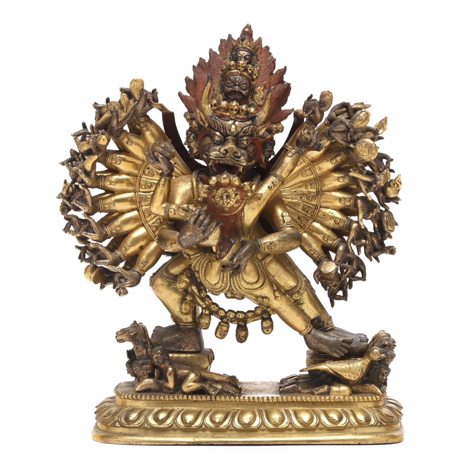A Sino-Tibetan Gilt Bronze Figure of Vajrabhairava and Vajravetali: A Sino-Tibetan Gilt Bronze Figure of Vajrabhairava and Vajravetali 18th century, two part cast figure of Vajrabhairava embracing his consort, with red pigment to his hair topped by multiple skulls and
