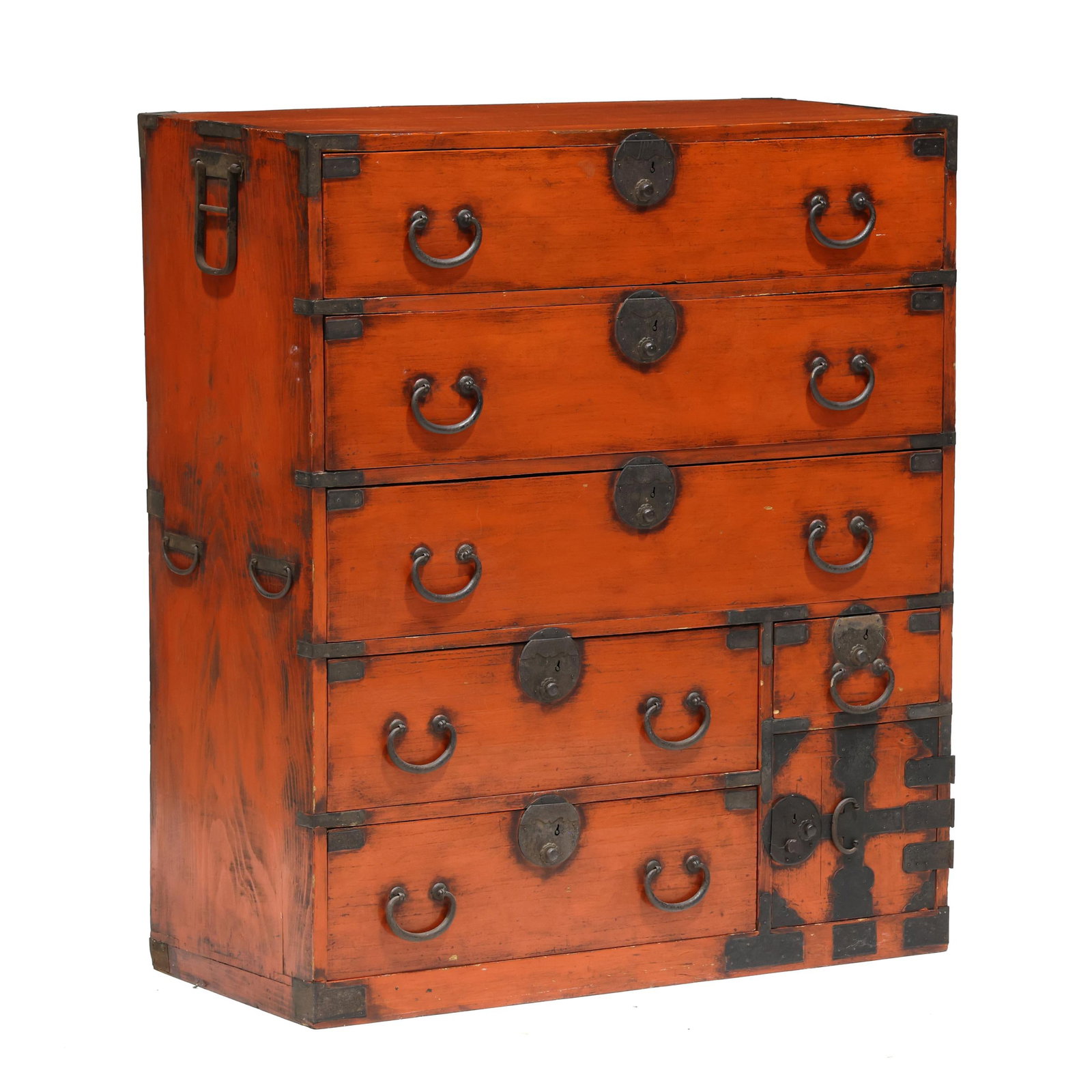 A Japanese Red Lacquered Isho Dansu Cabinet: A Japanese Red Lacquered Isho Dansu Cabinet Edo period (1615-1868), one part form, old red lacquered surface, iron corners, iron bail handles and hardware, the dovetailed case consisting of six drawer