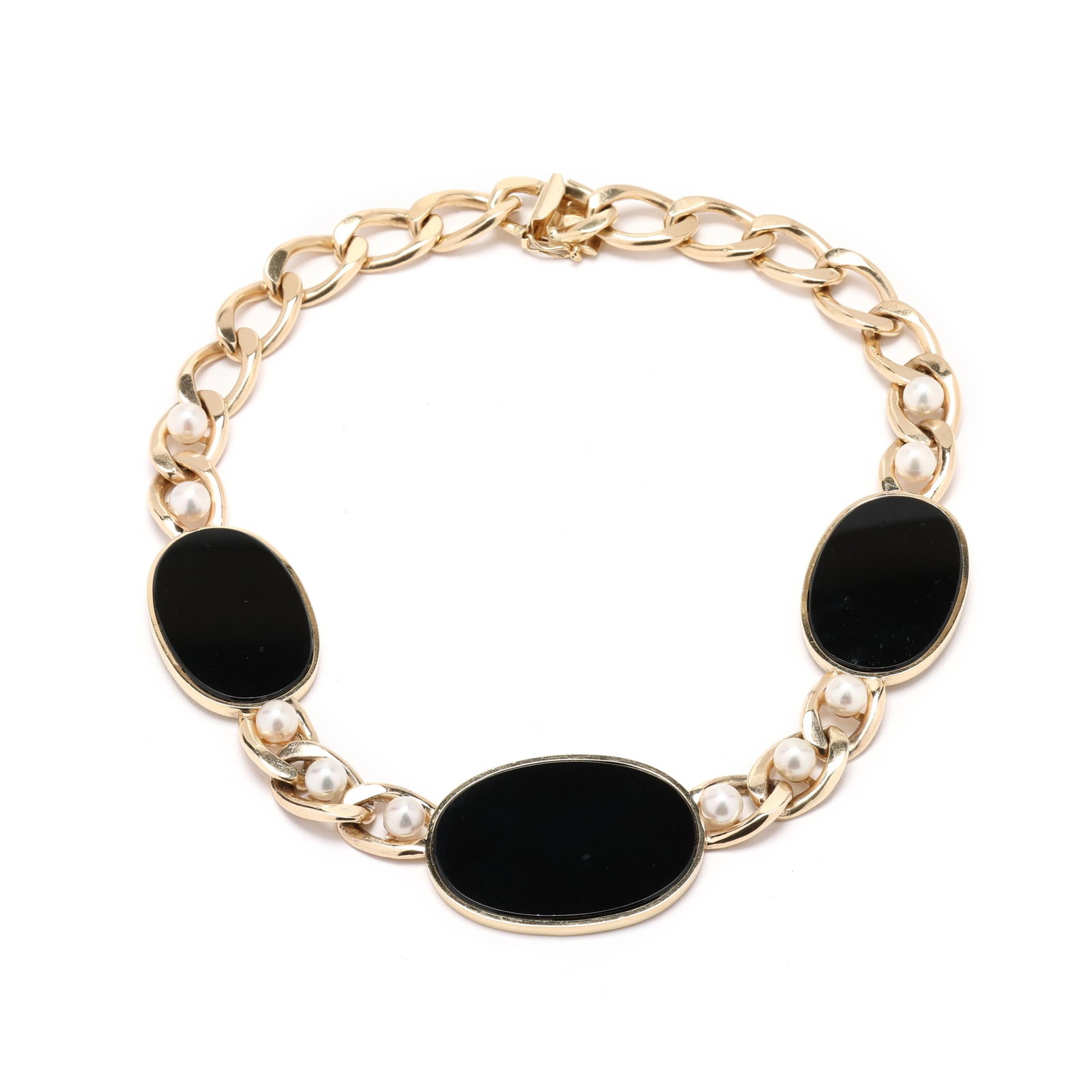 Gold, Black Onyx, and Pearl Necklace: Gold, Black Onyx, and Pearl Necklace curb link necklace with three oval tablet black onyx, ten of the curb links set with round cultured pearls (7.3mm average), completed with a box clasp with figure 