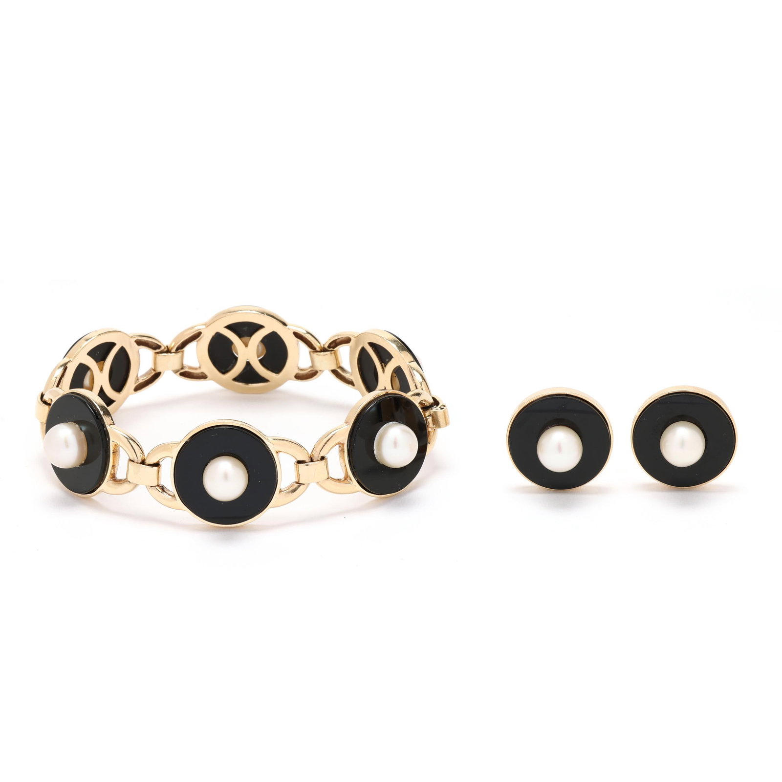 Gold, Black Onyx, and Pearl Bracelet and Earrings: Gold, Black Onyx, and Pearl Bracelet and Earrings bracelet with repeating links, each containing a round tablet black onyx set to the center with a round cultured pearl (8.5mm to 9.0mm), completed wit