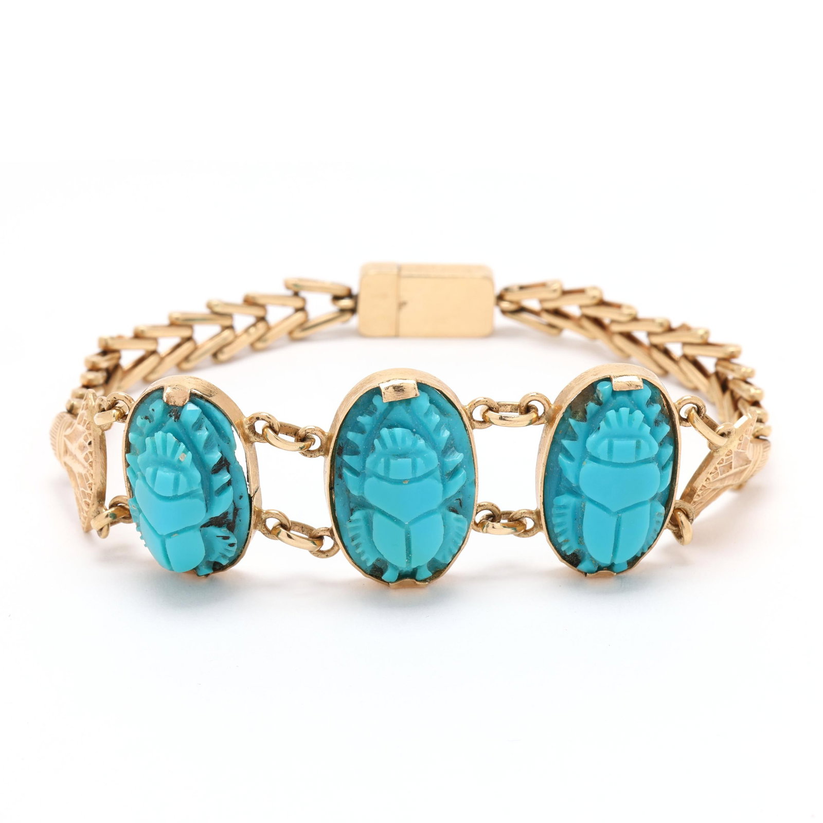Gold and Carved Turquoise Scarab Motif Bracelet, Egypt: Gold and Carved Turquoise Scarab Motif Bracelet, Egypt the center of the bracelet bezel set with three carved turquoise scarabs joined by chain links and joined to a chevron design chain with acanthus