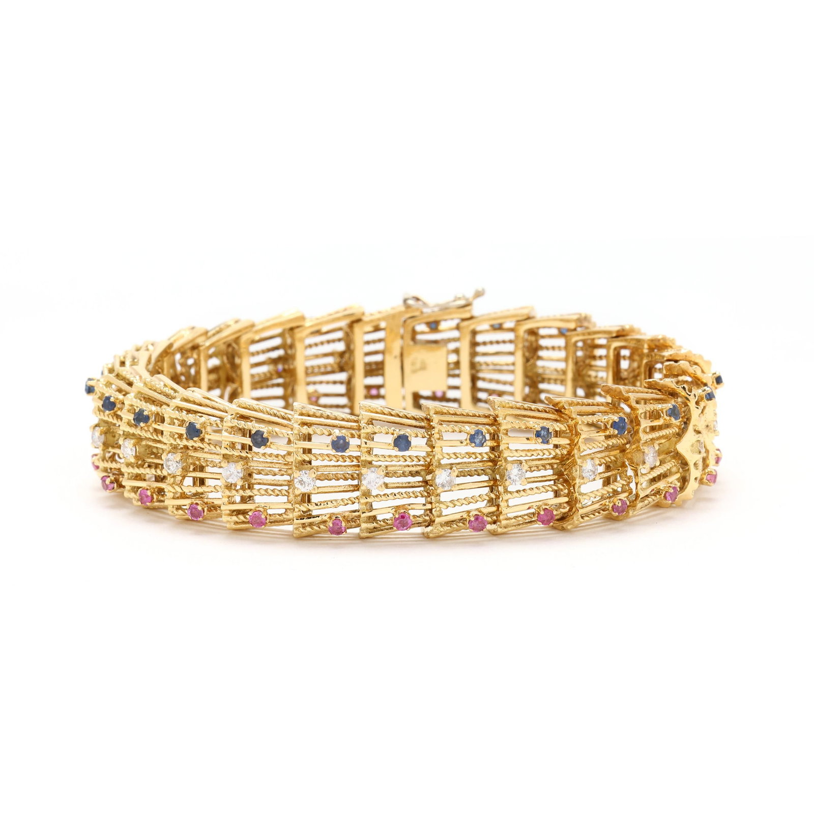 Retro Gold and Gem-Set Bracelet, Italy: Retro Gold and Gem-Set Bracelet, Italy bracelet in a repeating geometric motif with openwork links, prong set with full cut round diamonds weighing approximately 1.00 total carat (G-H color, I1-I2 cla