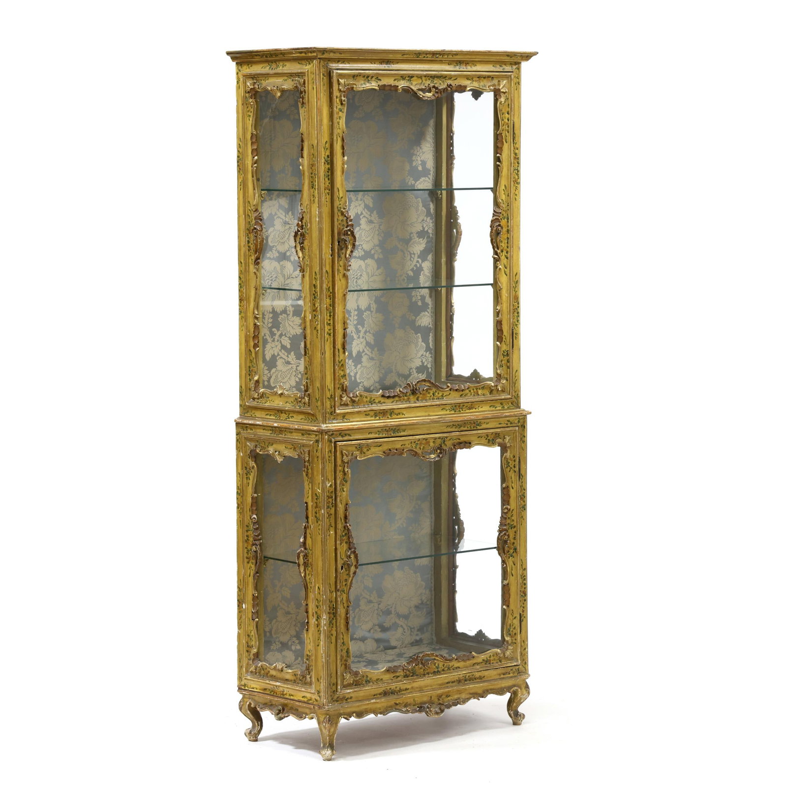Venetian Rococo Revival Carved and Painted Vitrine: Venetian Rococo Revival Carved and Painted Vitrine second half 19th century, one part form, pine, all over yellow field with hand-painted floral sprays and gilt highlights, the case with two hinged