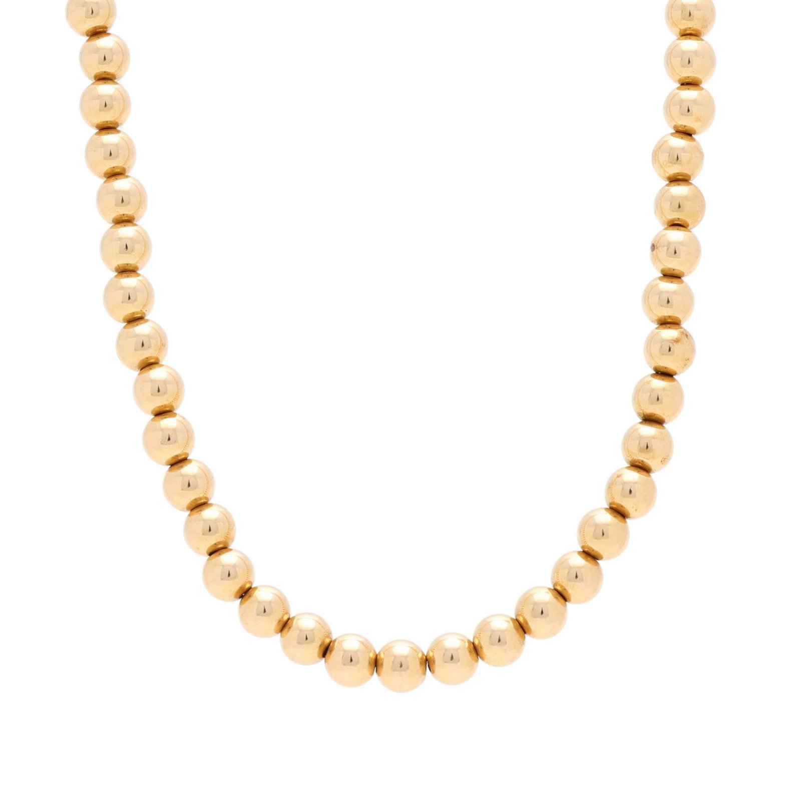 Gold Bead Necklace: Gold Bead Necklace the gold chain strung with gold beads, completed with a spring ring clasp, stamped 14K. 6.4mm x 21.25 in. 18.0 dwt. From a Private Williamsburg, Virginia Collection Additional high-